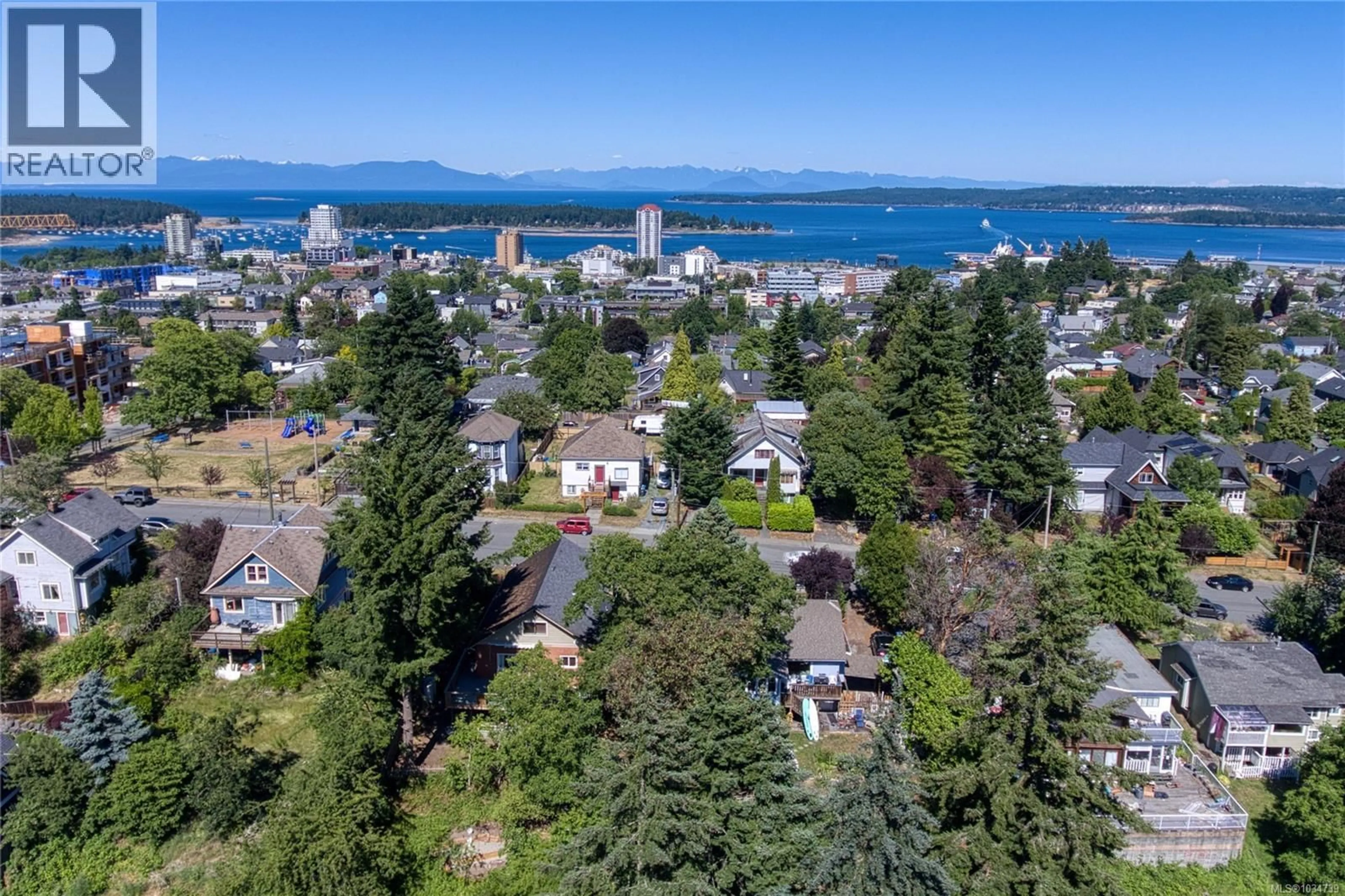 A pic from outside/outdoor area/front of a property/back of a property/a pic from drone, water/lake/river/ocean view for 415 MACHLEARY STREET, Nanaimo British Columbia V9R2H1