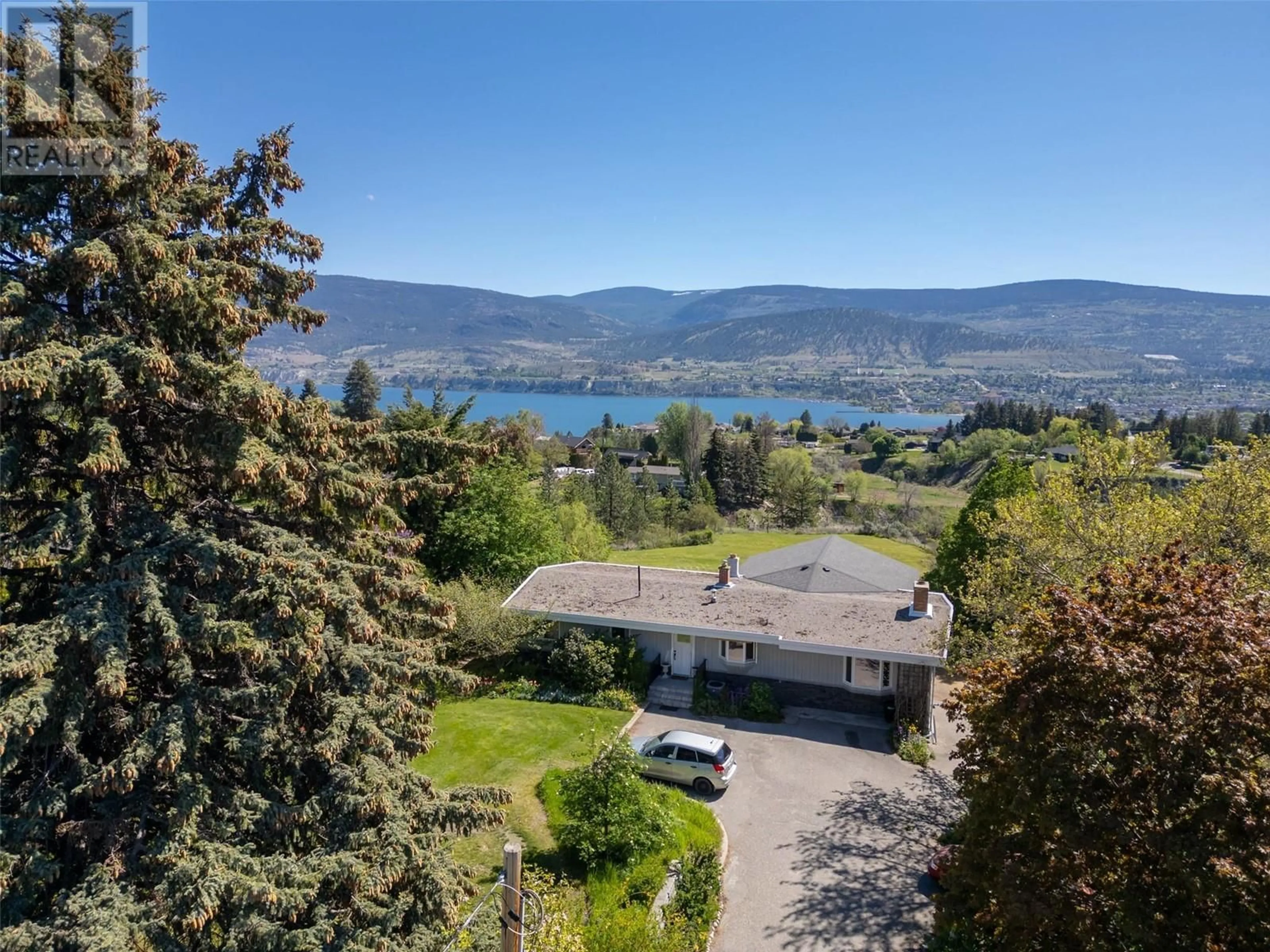 A pic from outside/outdoor area/front of a property/back of a property/a pic from drone, water/lake/river/ocean view for 2017 WEST BENCH DRIVE, Penticton British Columbia V2A7K8