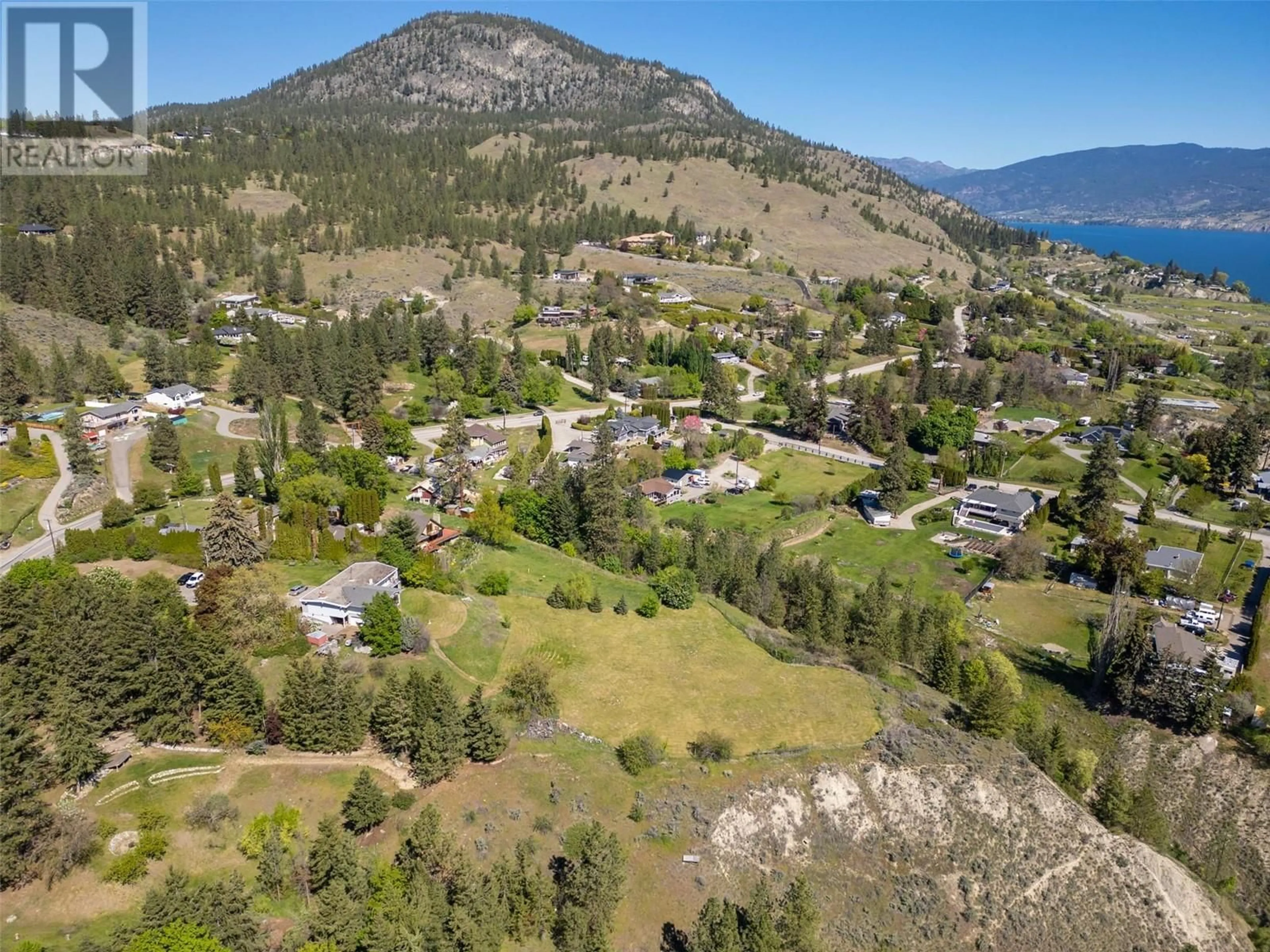 A pic from outside/outdoor area/front of a property/back of a property/a pic from drone, mountain view for 2017 WEST BENCH DRIVE, Penticton British Columbia V2A7K8