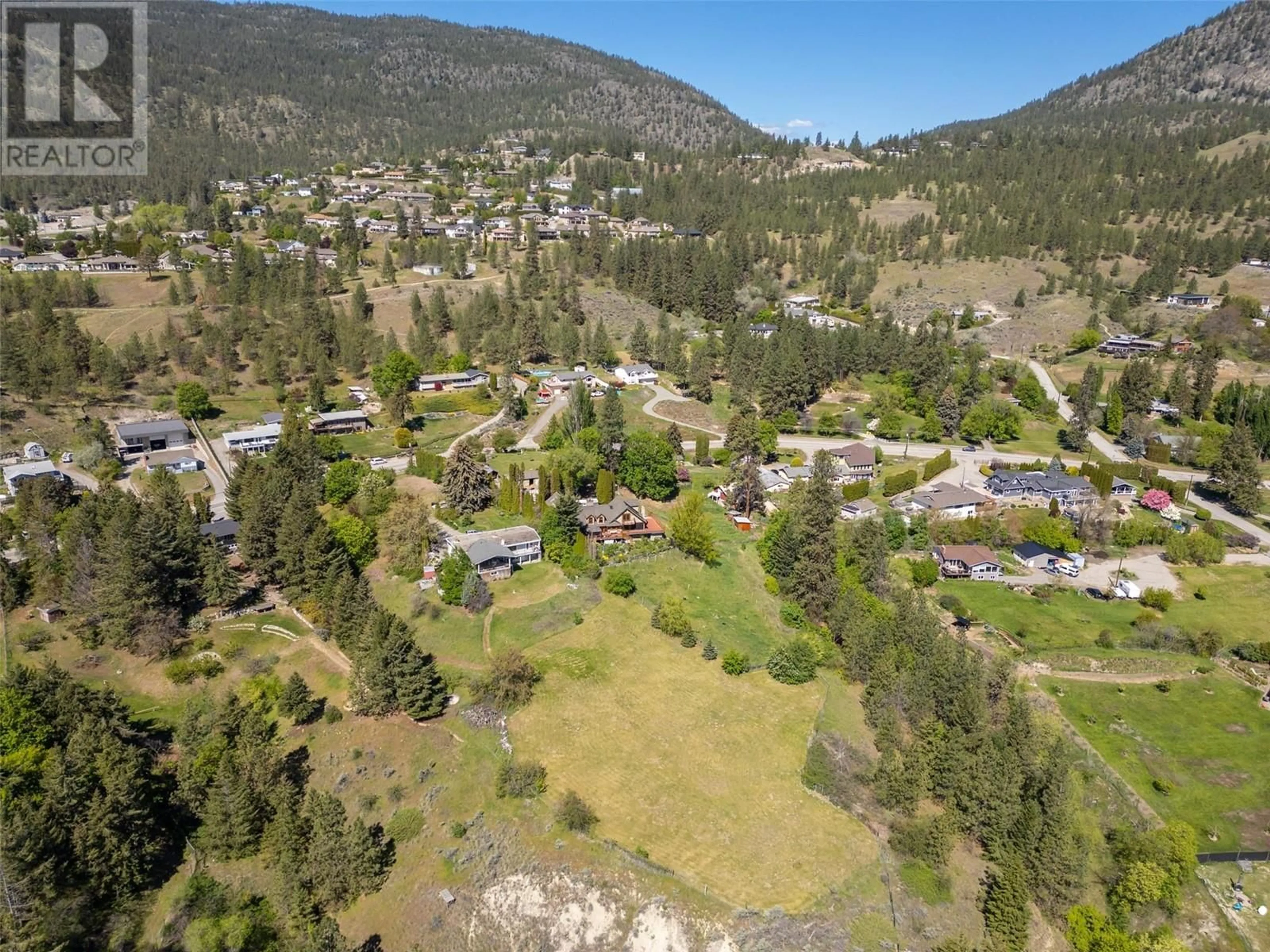 A pic from outside/outdoor area/front of a property/back of a property/a pic from drone, mountain view for 2017 WEST BENCH DRIVE, Penticton British Columbia V2A7K8