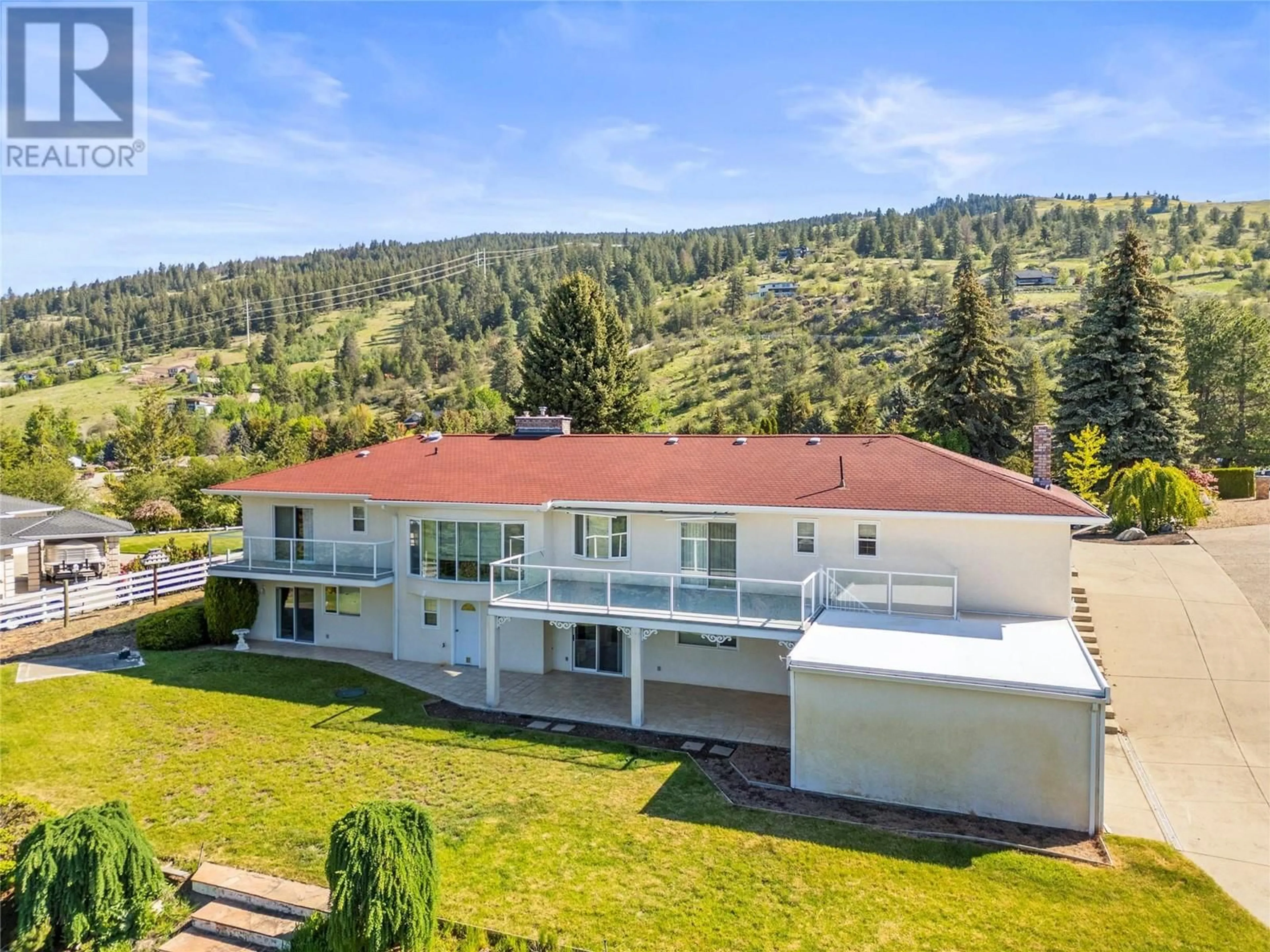 A pic from outside/outdoor area/front of a property/back of a property/a pic from drone, mountain view for 626 UPLAND DRIVE, Coldstream British Columbia V1B2X8