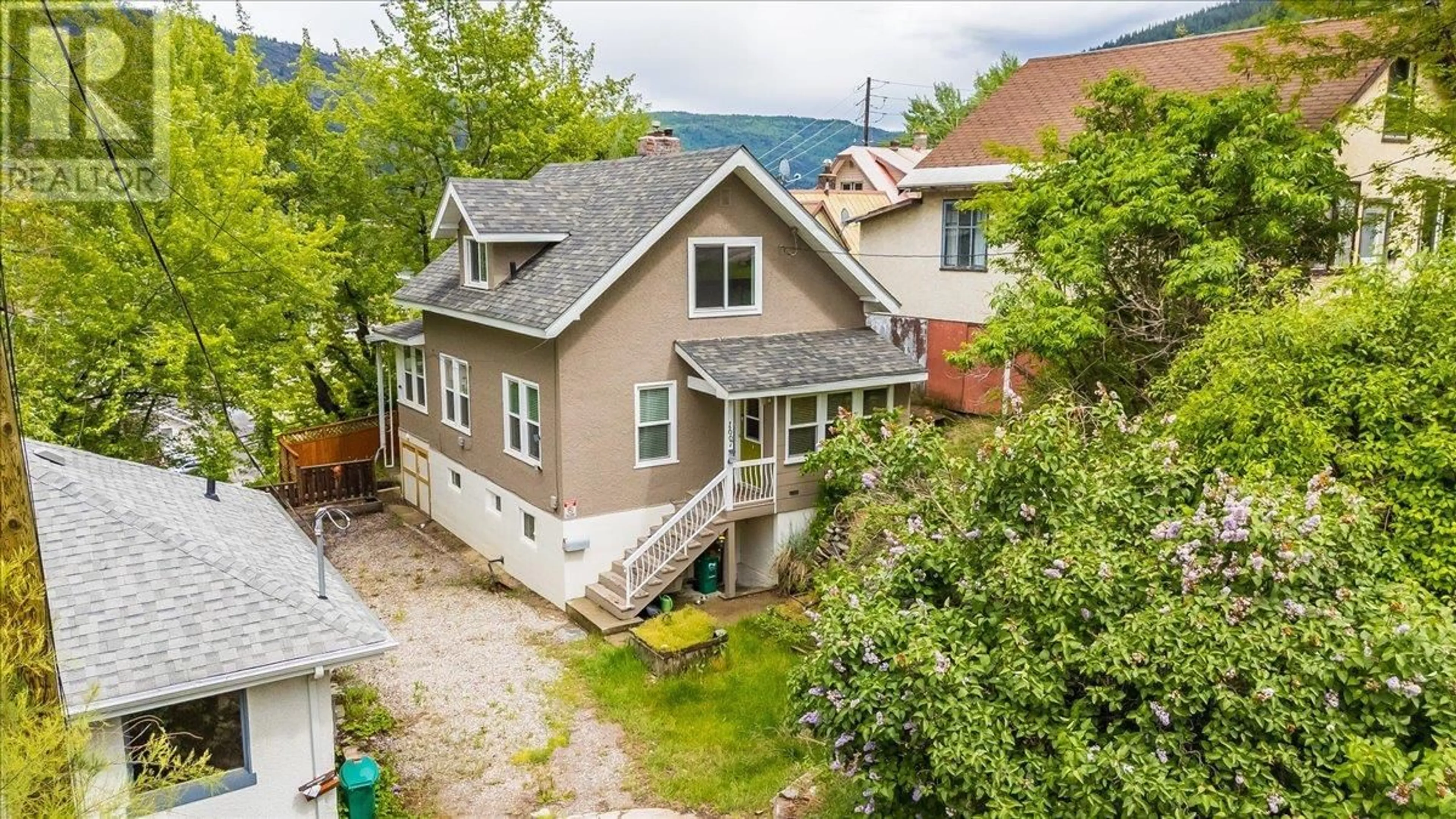 A pic from outside/outdoor area/front of a property/back of a property/a pic from drone, street for 1667 CEDAR AVENUE, Trail British Columbia V1R4C9