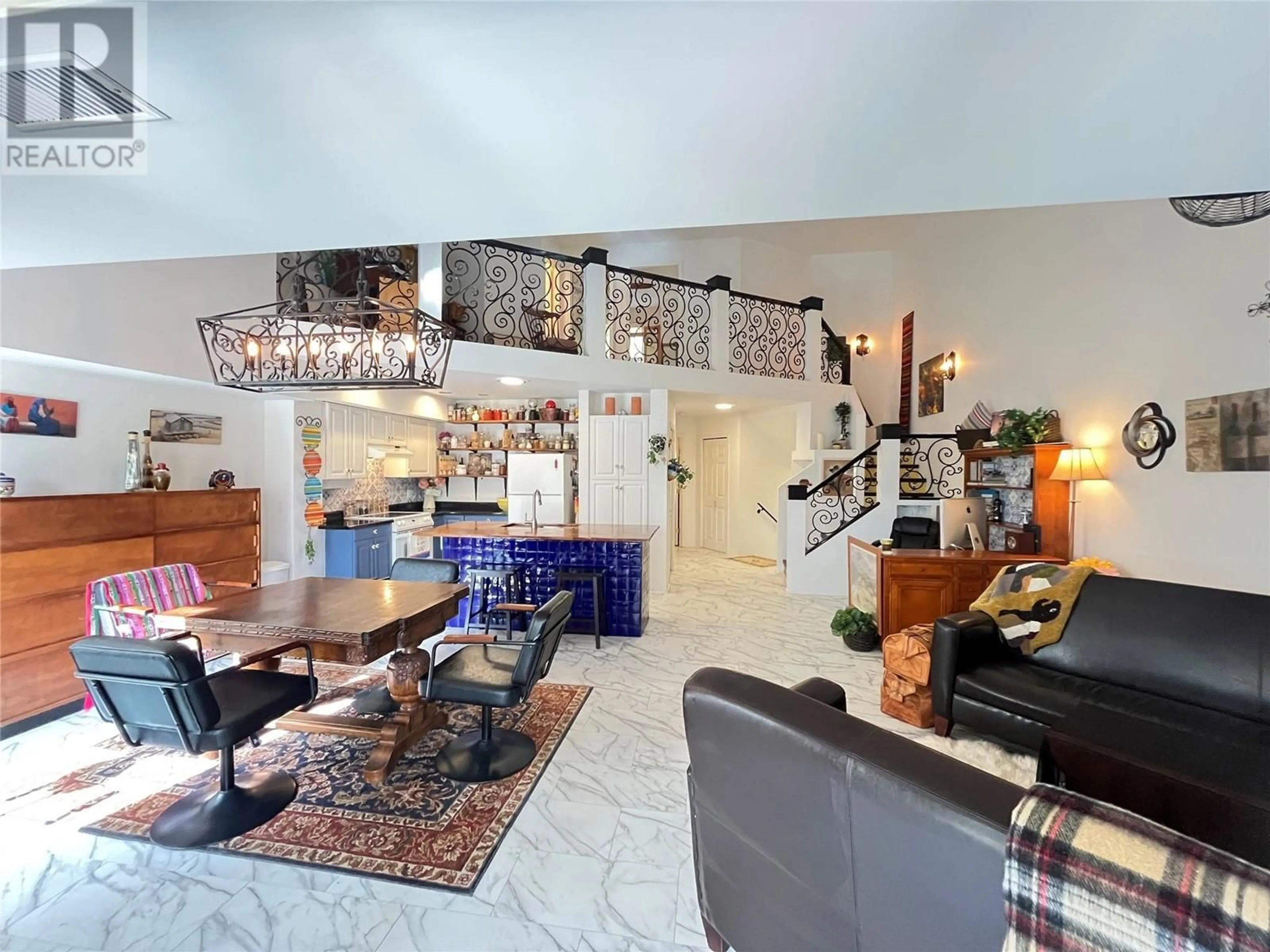 Open concept kitchen, ceramic/tile floor for 203 - 3179 VIA CENTRALE ROAD, Kelowna British Columbia V1V2J5