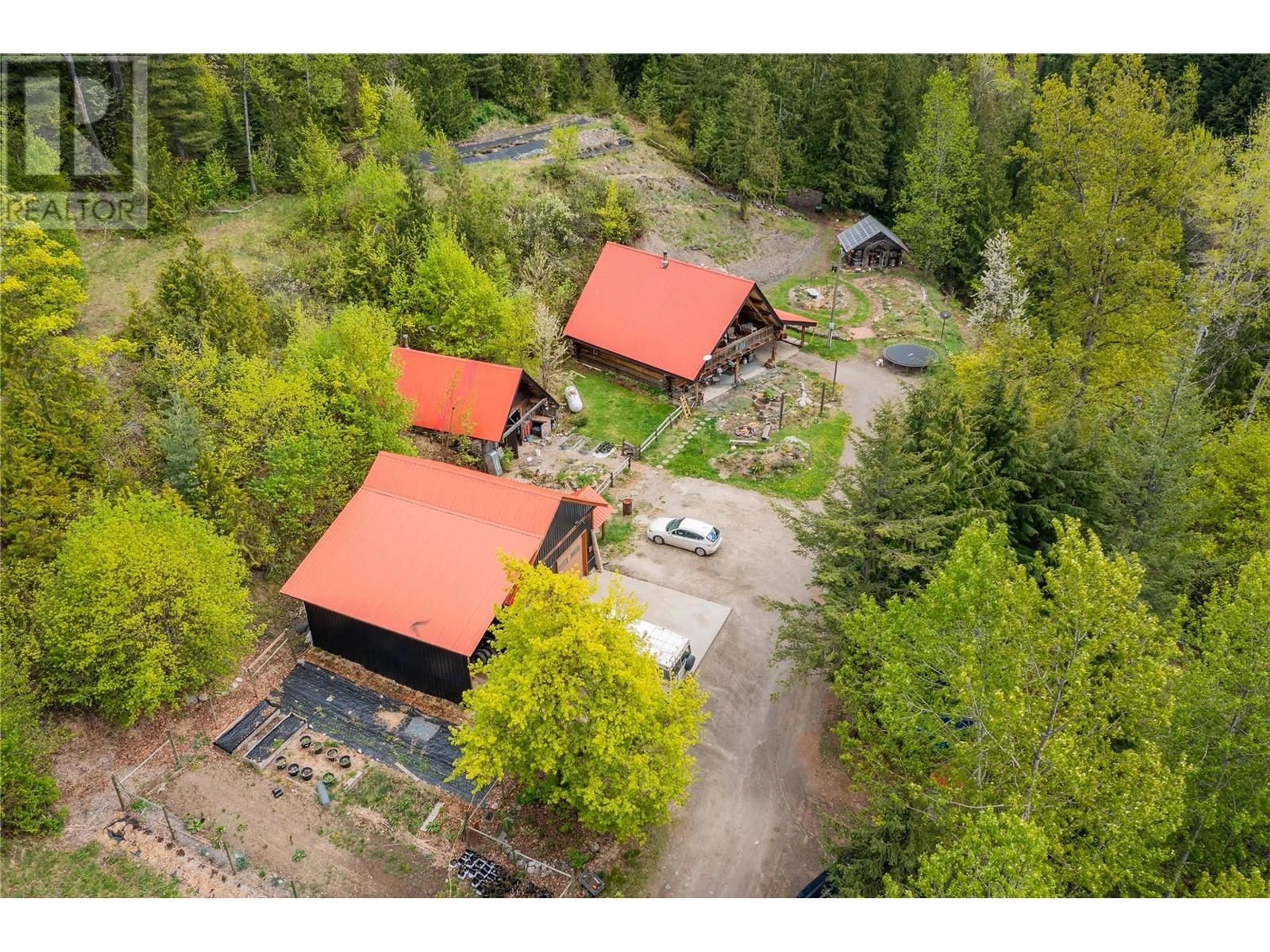 A pic from outside/outdoor area/front of a property/back of a property/a pic from drone, forest/trees view for 122 SILVER STREET, Sandon British Columbia V0G1S0
