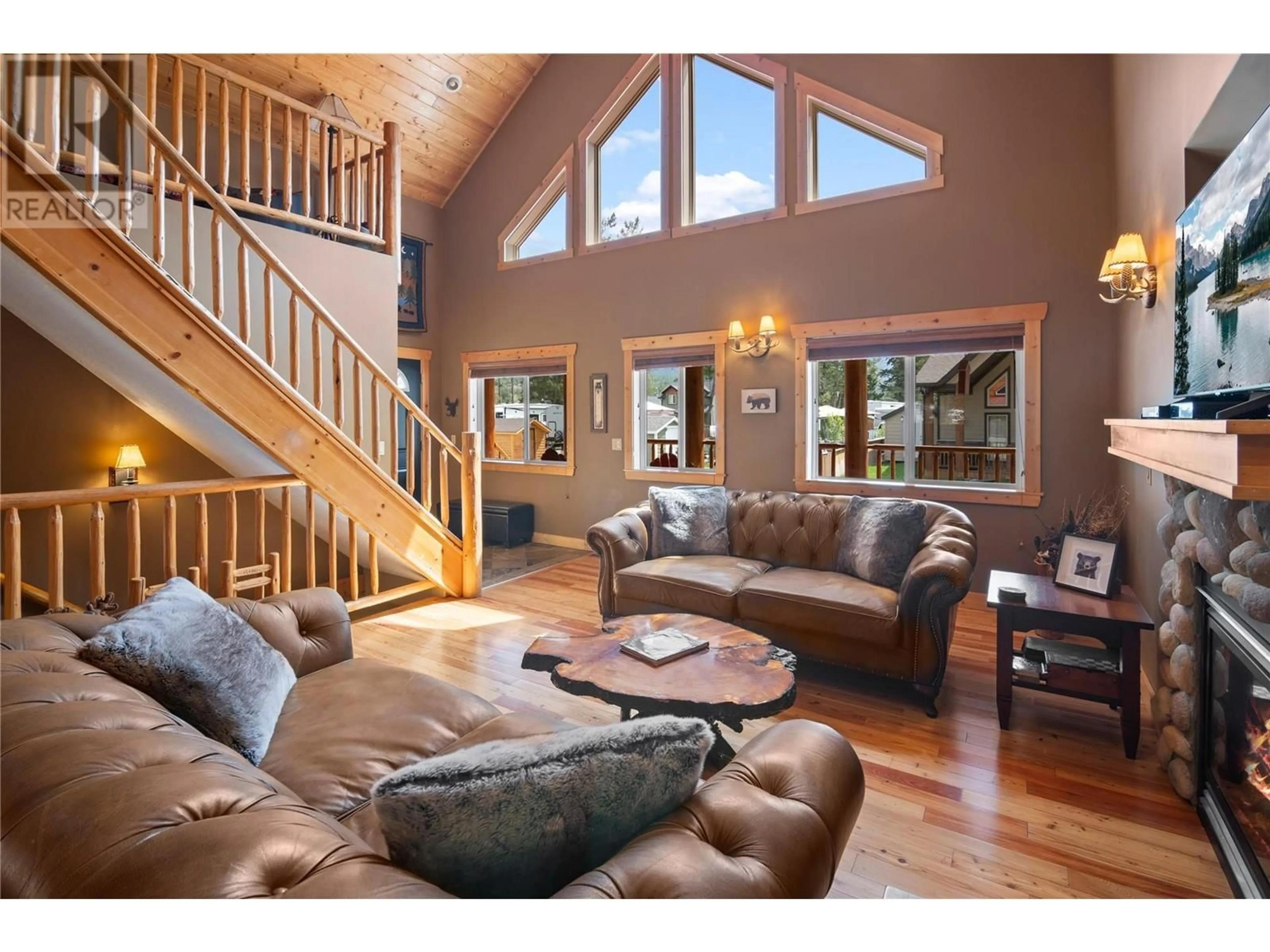 Living room with furniture, wood/laminate floor for 12 - 4868 RIVERVIEW DRIVE, Edgewater British Columbia V0A1E0