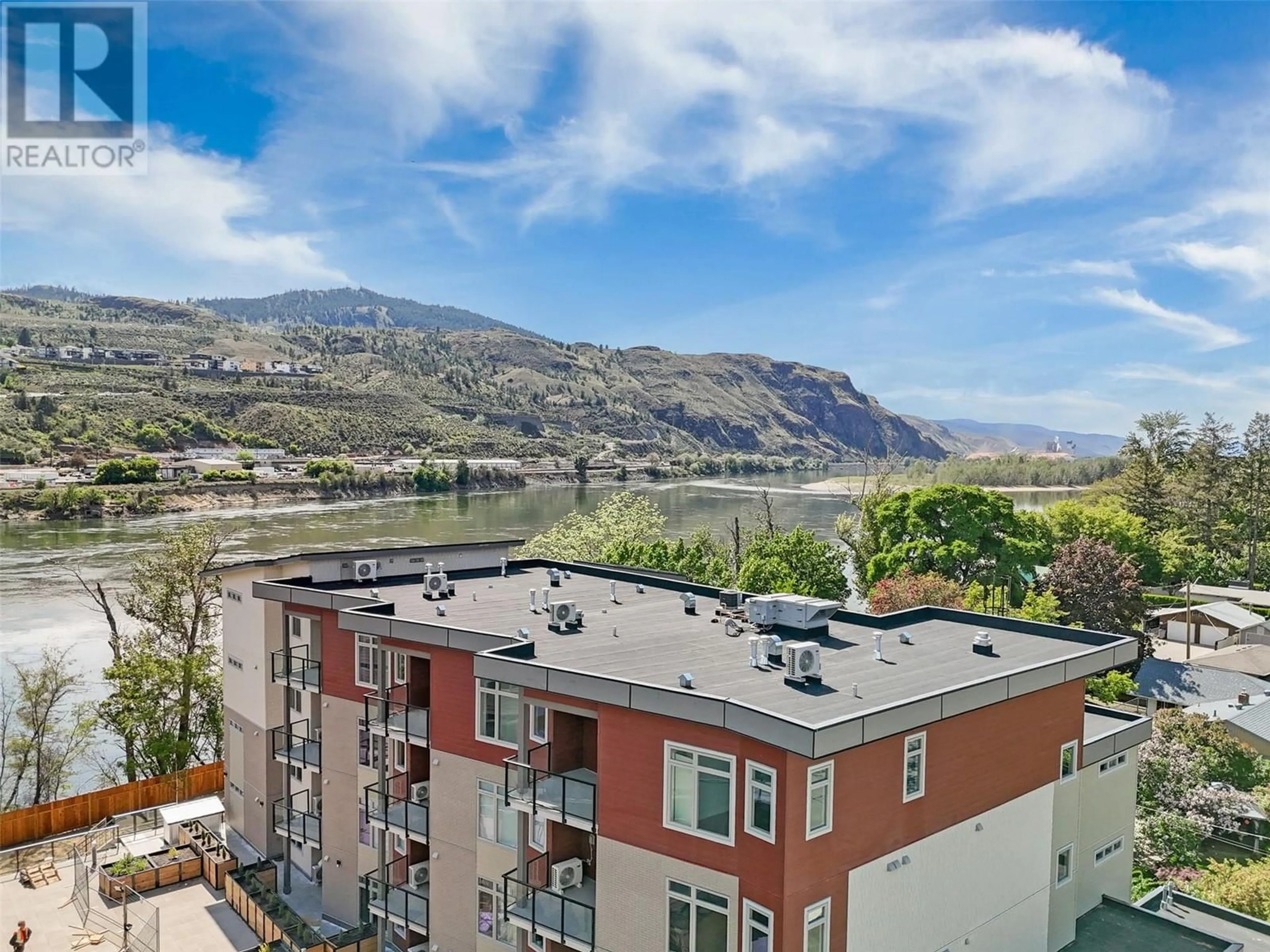A pic from outside/outdoor area/front of a property/back of a property/a pic from drone, water/lake/river/ocean view for 401 - 215 ROYAL AVENUE, Kamloops British Columbia V2B3P2