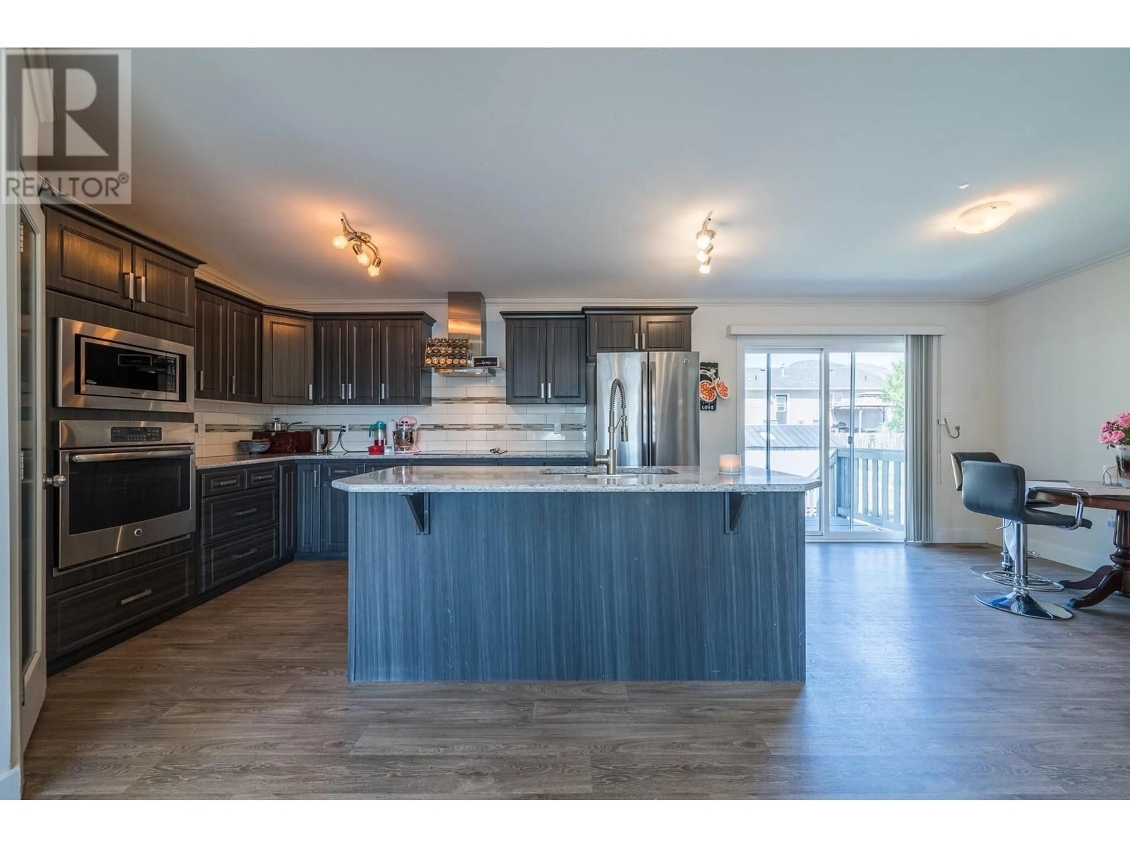 Open concept kitchen, wood/laminate floor for B11 - 7155 DALLAS DRIVE, Kamloops British Columbia V2C4T1