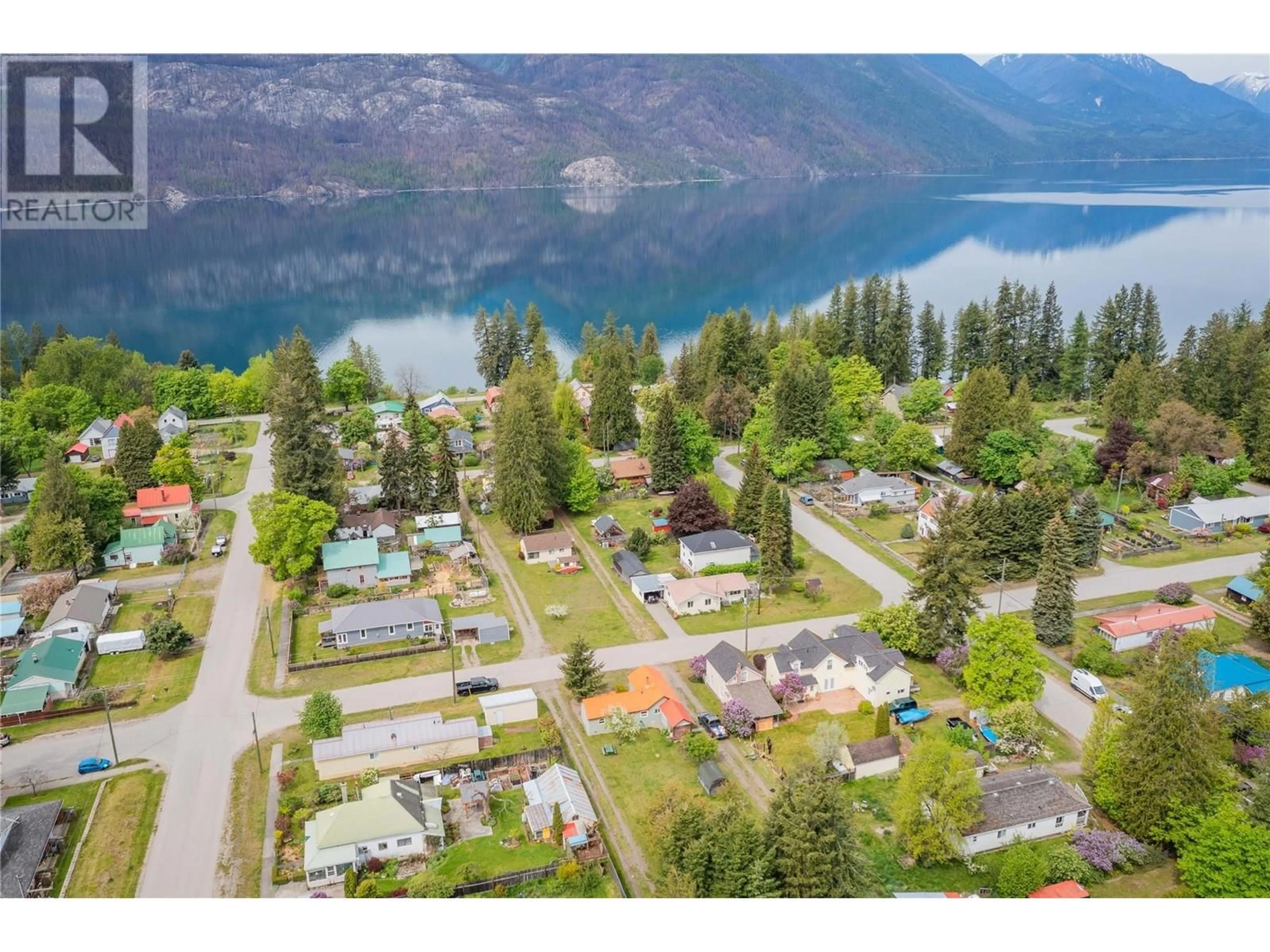 A pic from outside/outdoor area/front of a property/back of a property/a pic from drone, water/lake/river/ocean view for 912 KILDARE STREET, New Denver British Columbia V0G1S0