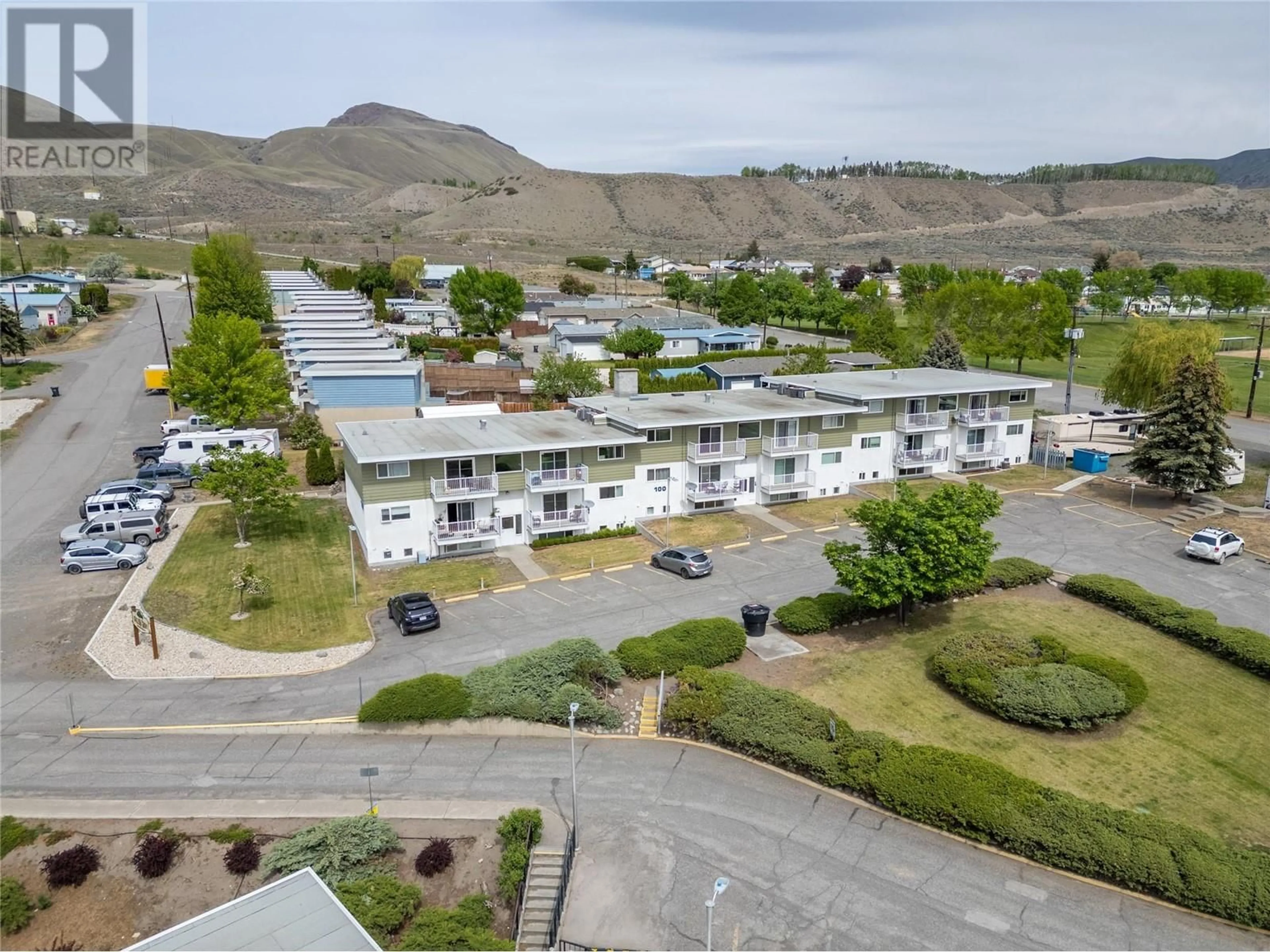 A pic from outside/outdoor area/front of a property/back of a property/a pic from drone, mountain view for 103 - 825 HILL STREET, Ashcroft British Columbia V0K1A0