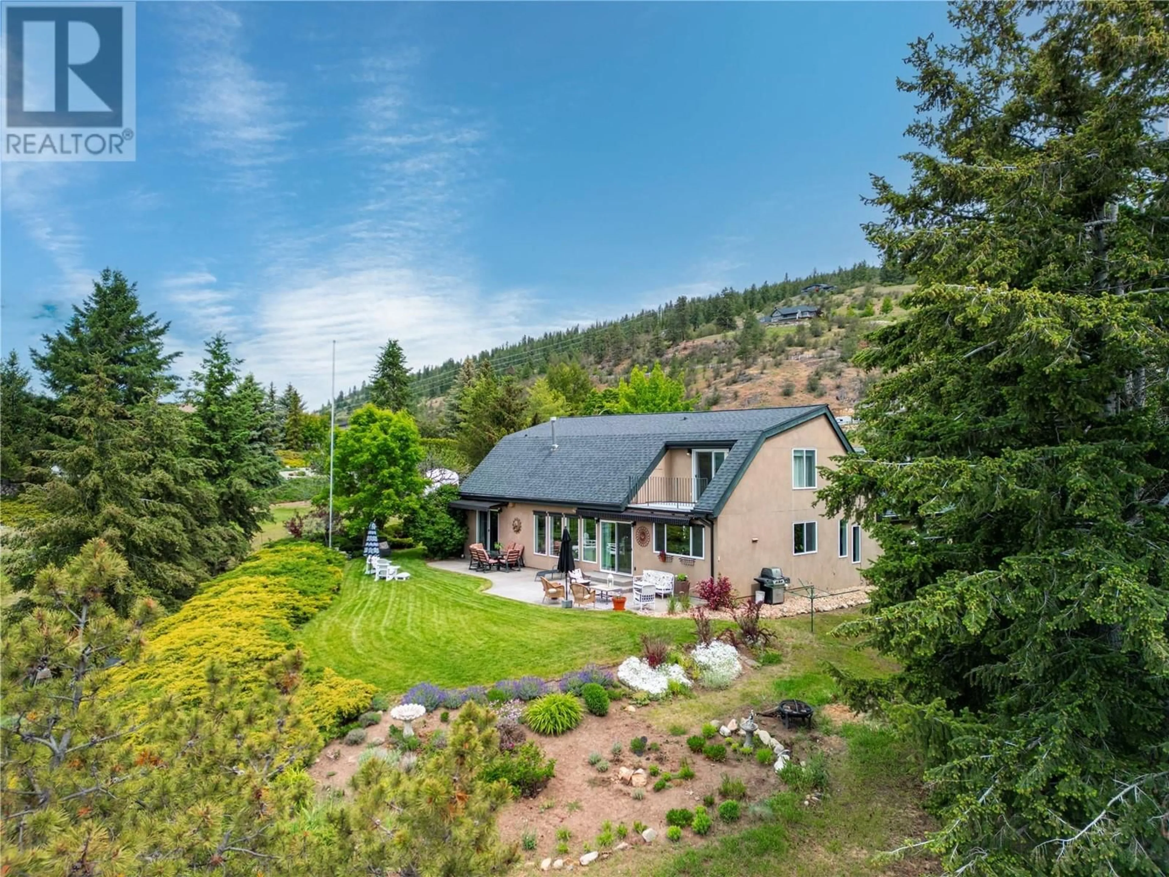 A pic from outside/outdoor area/front of a property/back of a property/a pic from drone, mountain view for 548 UPLAND DRIVE, Coldstream British Columbia V1B2X8