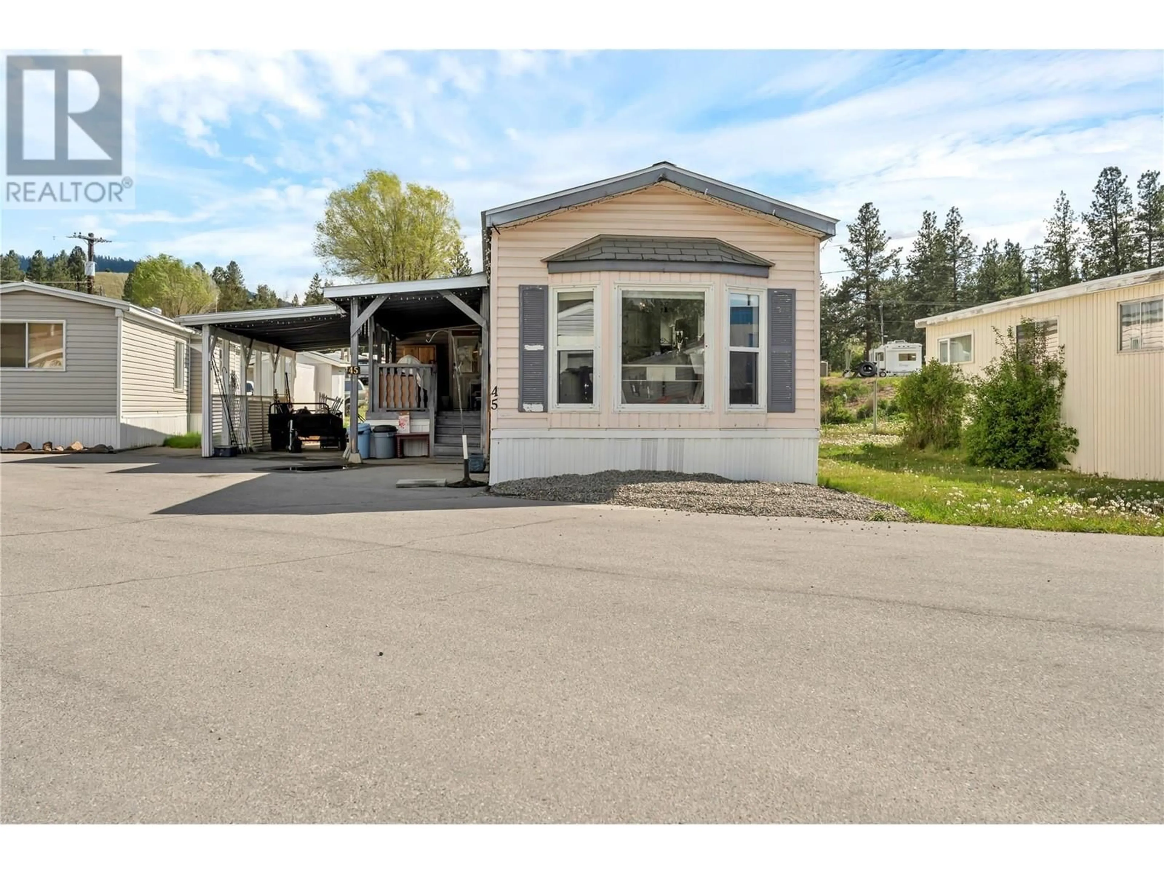Home with vinyl exterior material, street for 45 - 263 HWY 3 OTHER, Princeton British Columbia V0X1W0