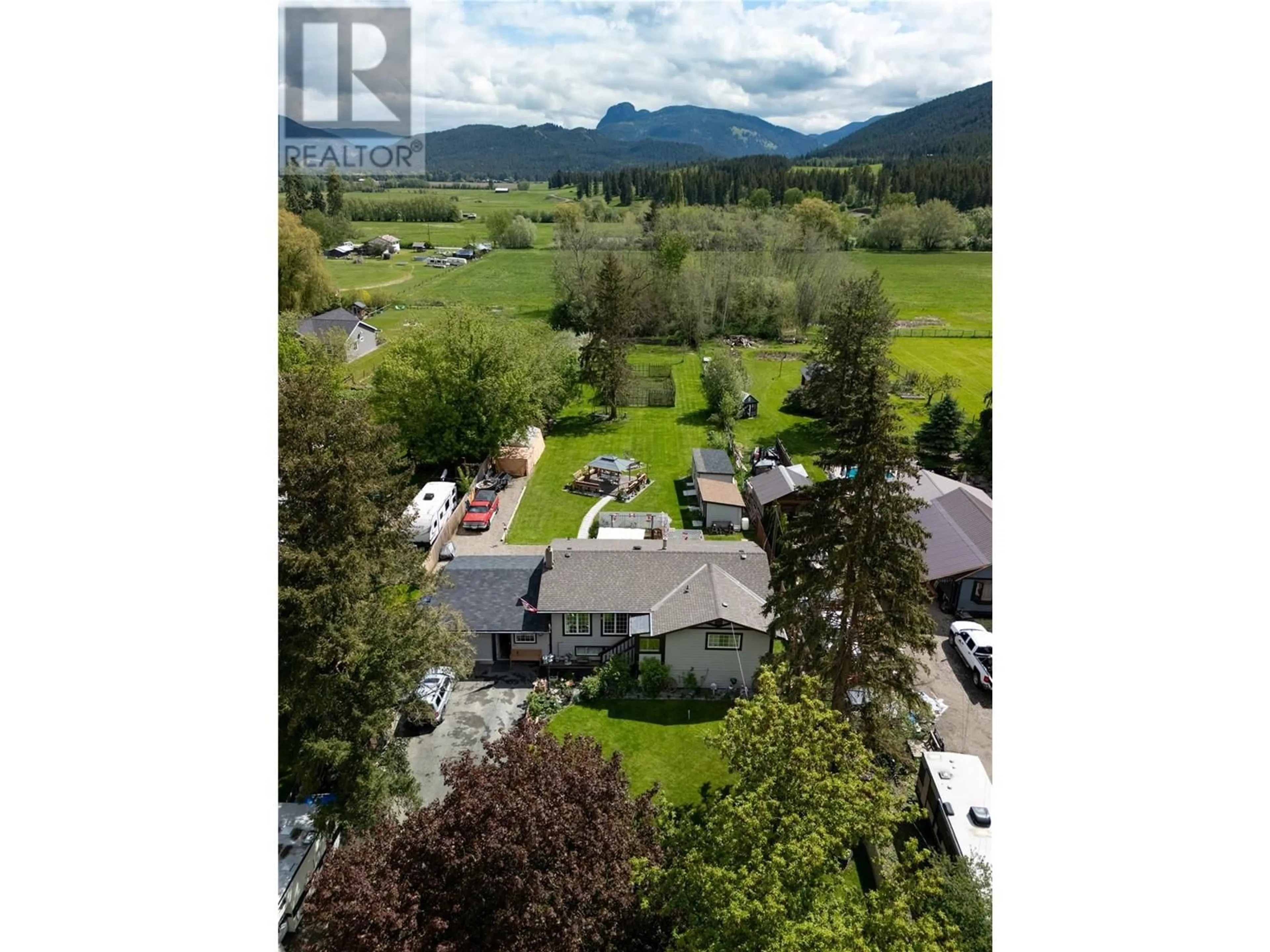 A pic from outside/outdoor area/front of a property/back of a property/a pic from drone, mountain view for 170 WHITEVALE ROAD, Lumby British Columbia V0E2G7