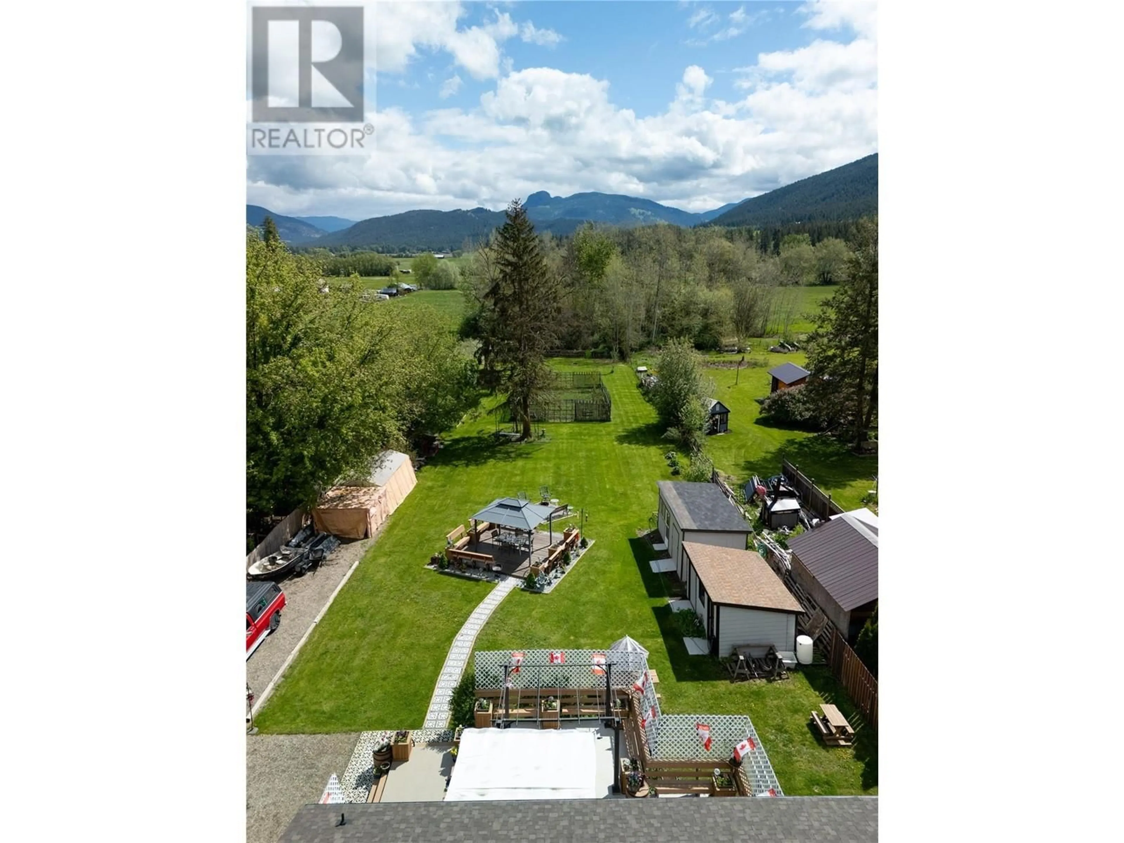 A pic from outside/outdoor area/front of a property/back of a property/a pic from drone, water/lake/river/ocean view for 170 WHITEVALE ROAD, Lumby British Columbia V0E2G7