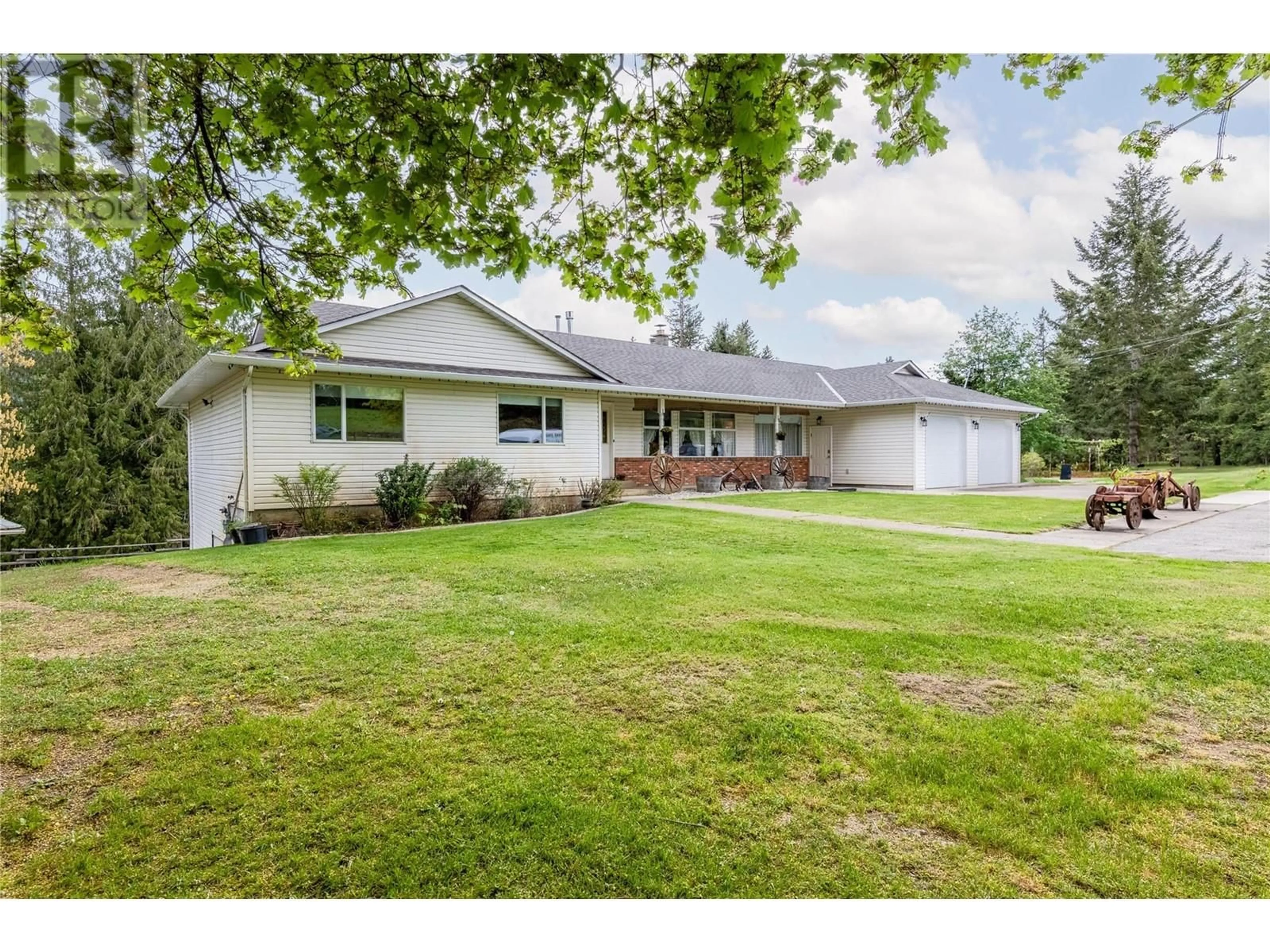 A pic from outside/outdoor area/front of a property/back of a property/a pic from drone, street for 2240 97B HIGHWAY SOUTHEAST, Salmon Arm British Columbia V1E1X6