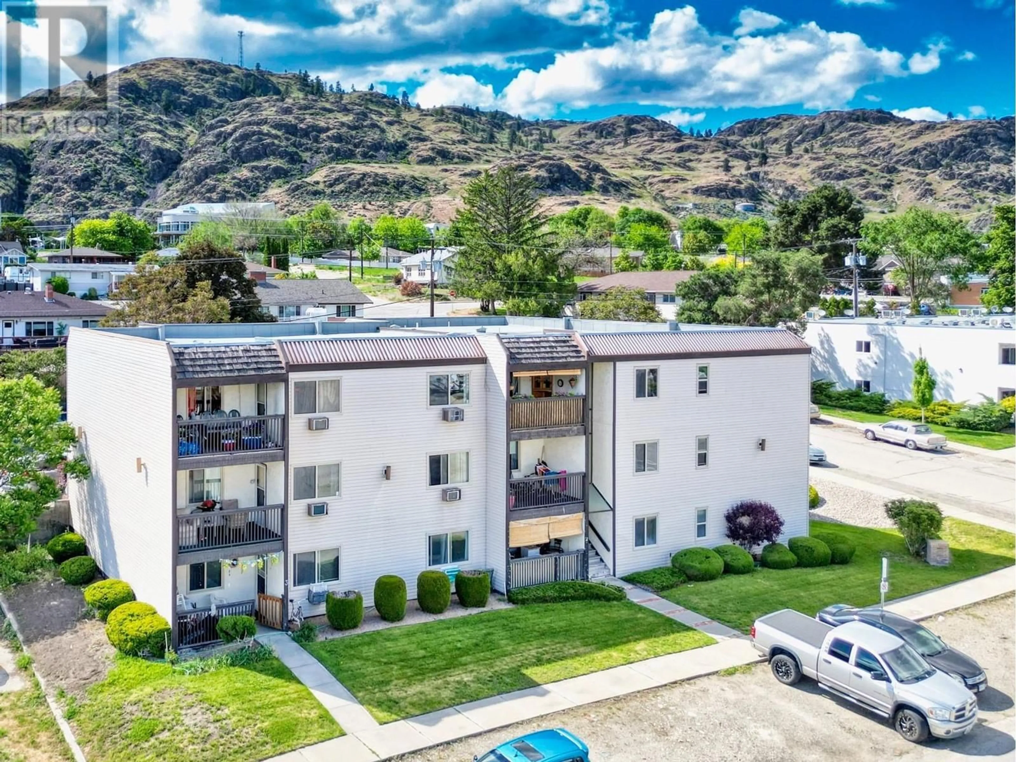 A pic from outside/outdoor area/front of a property/back of a property/a pic from drone, mountain view for 10 - 529 CO-OP AVENUE, Oliver British Columbia V0H1T0