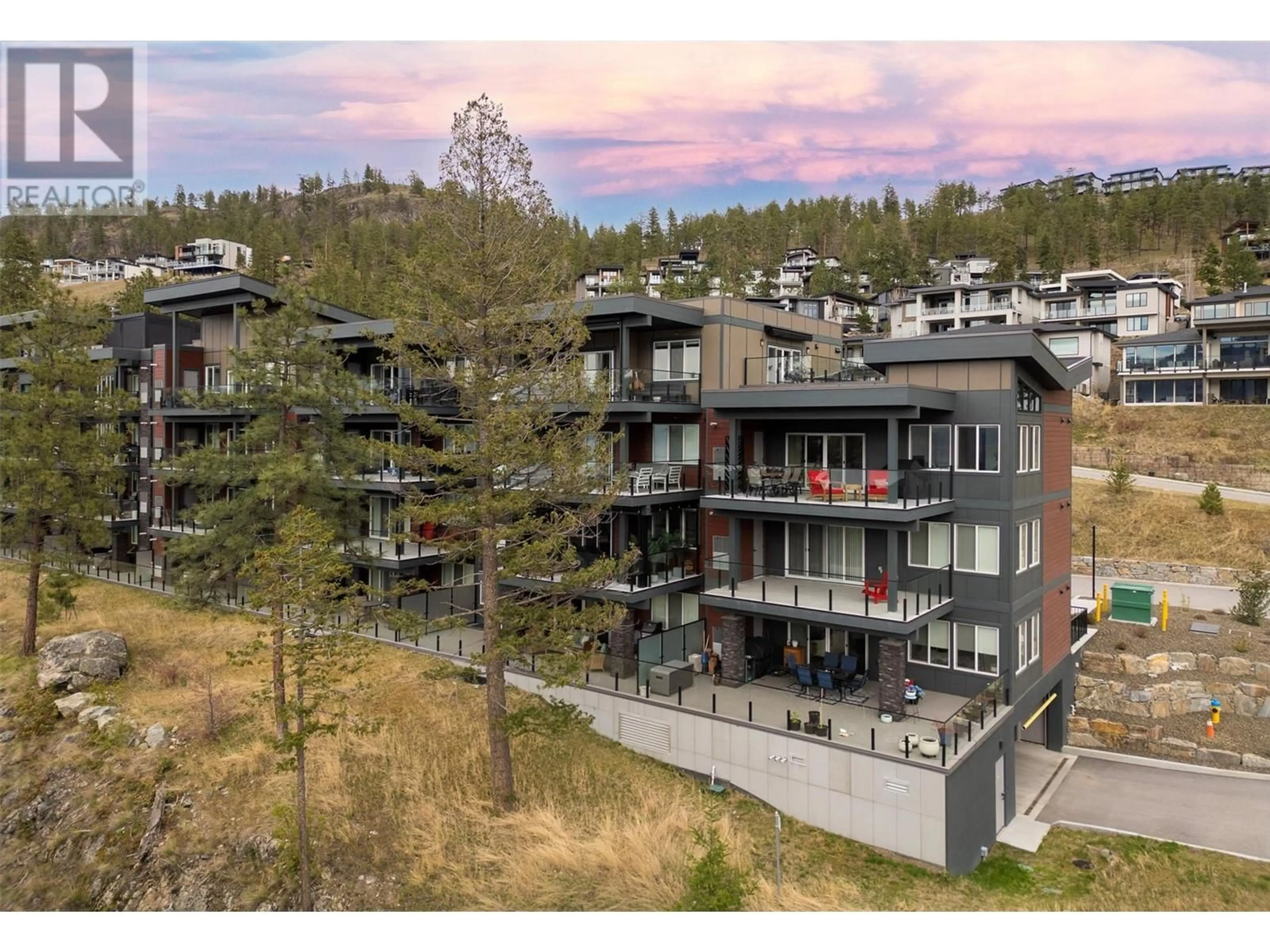 A pic from outside/outdoor area/front of a property/back of a property/a pic from drone, mountain view for 301 - 3434 MCKINLEY BEACH DRIVE, Kelowna British Columbia V1V0H3