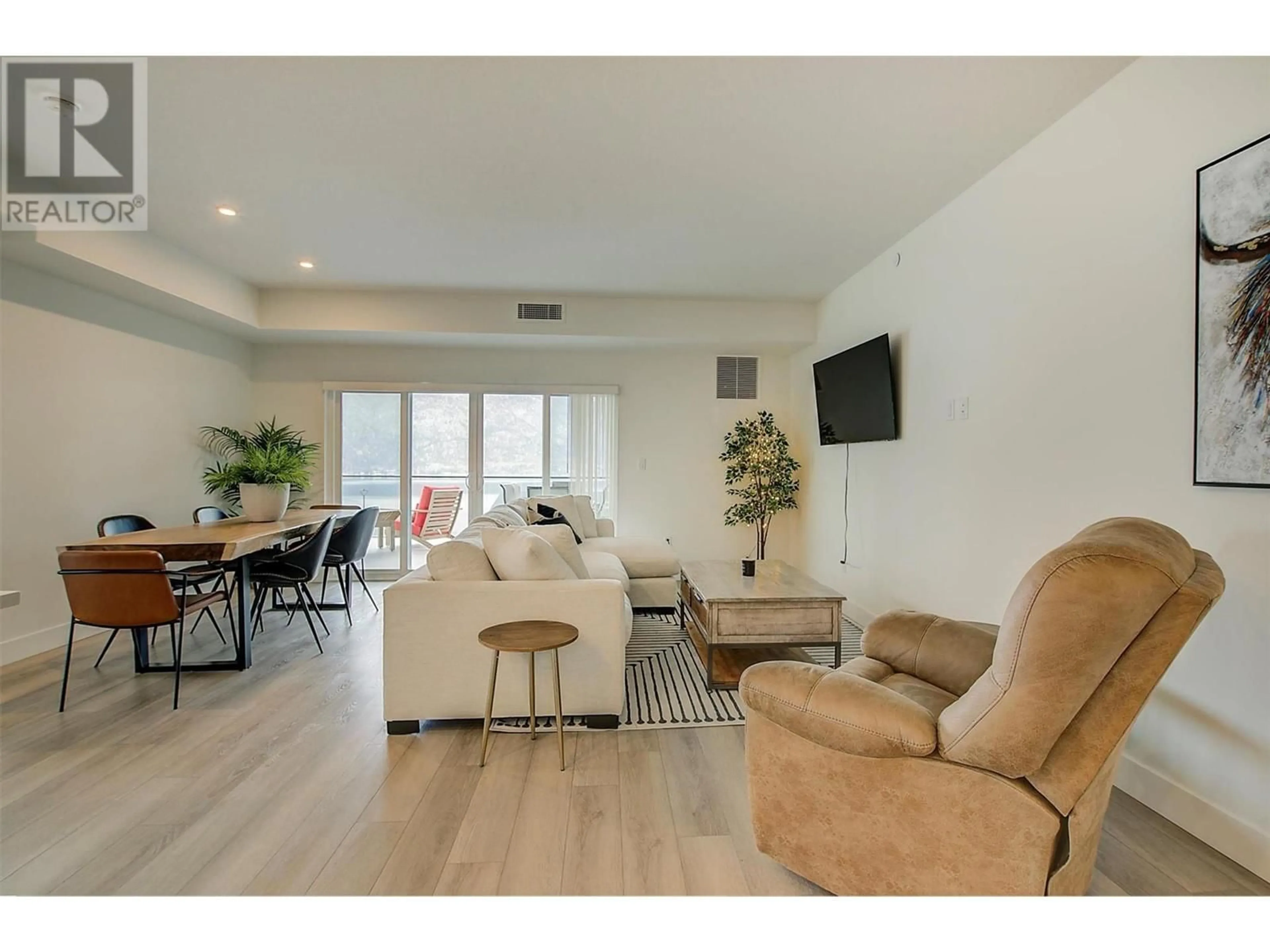 Living room with furniture, unknown for 301 - 3434 MCKINLEY BEACH DRIVE, Kelowna British Columbia V1V0H3