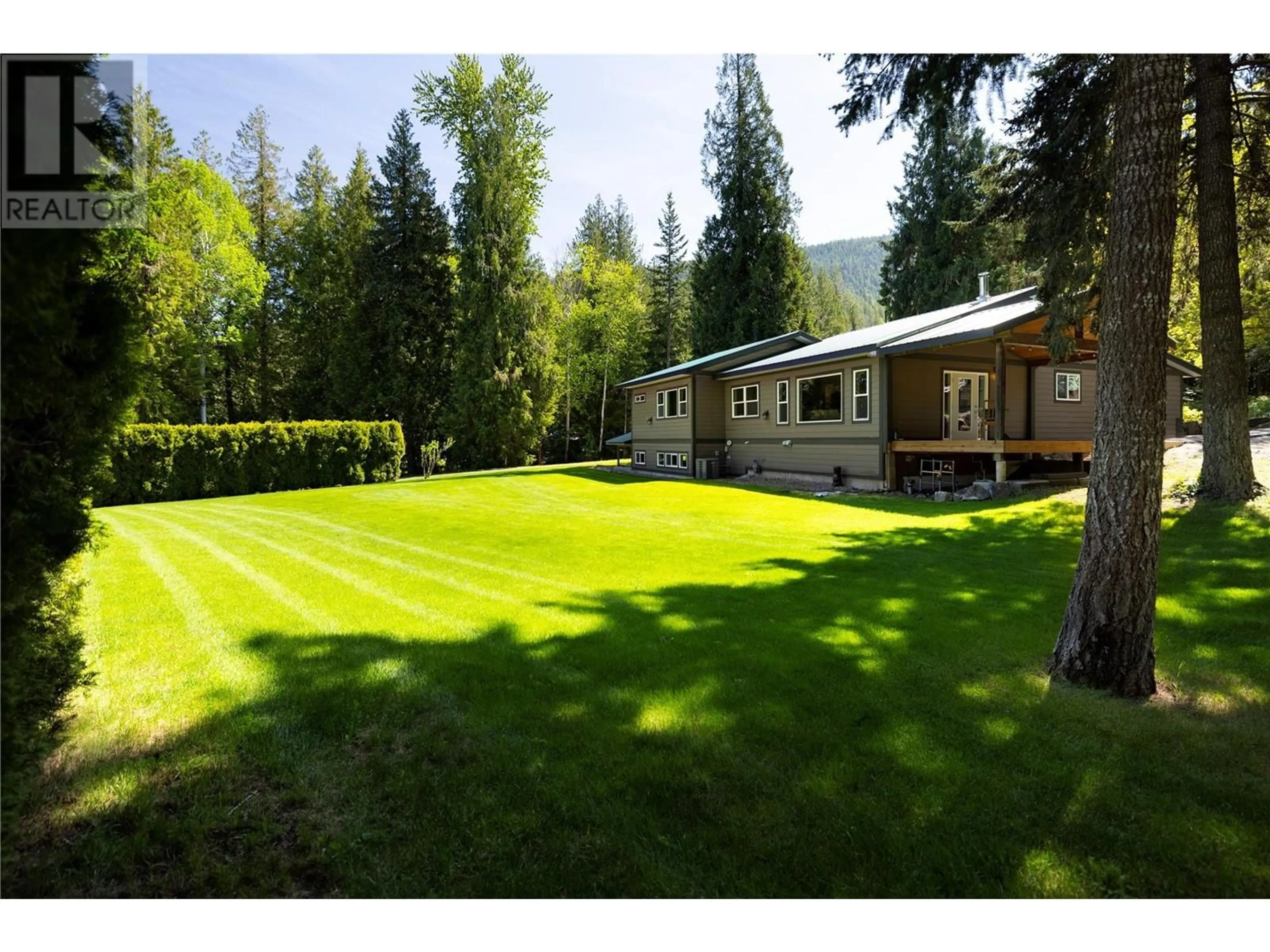 A pic from outside/outdoor area/front of a property/back of a property/a pic from drone, mountain view for 2350 POWERHOUSE ROAD, Armstrong British Columbia V0E1B8