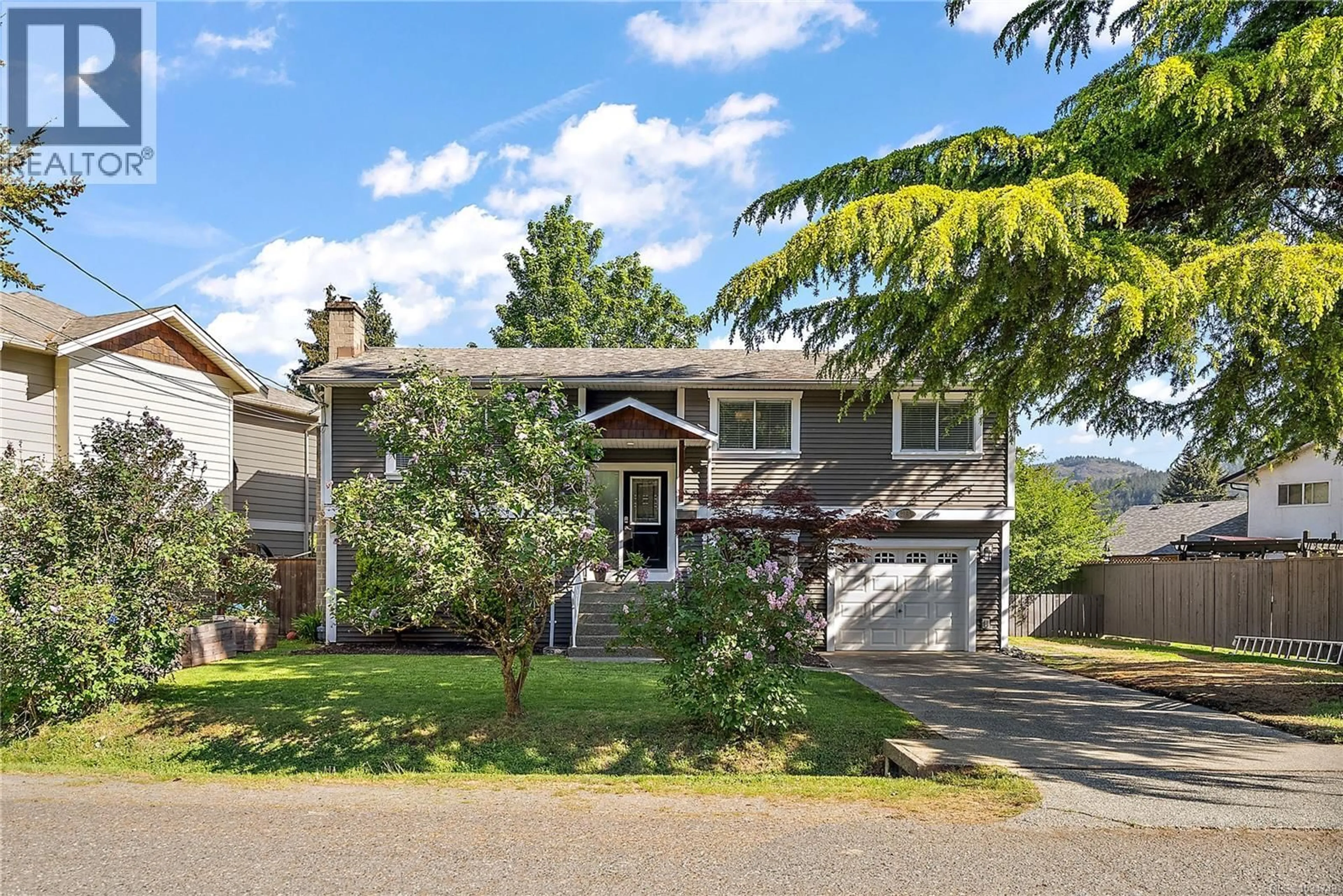 Home with vinyl exterior material, street for 2980 HARLEQUIN PLACE, Langford British Columbia V9B5B1