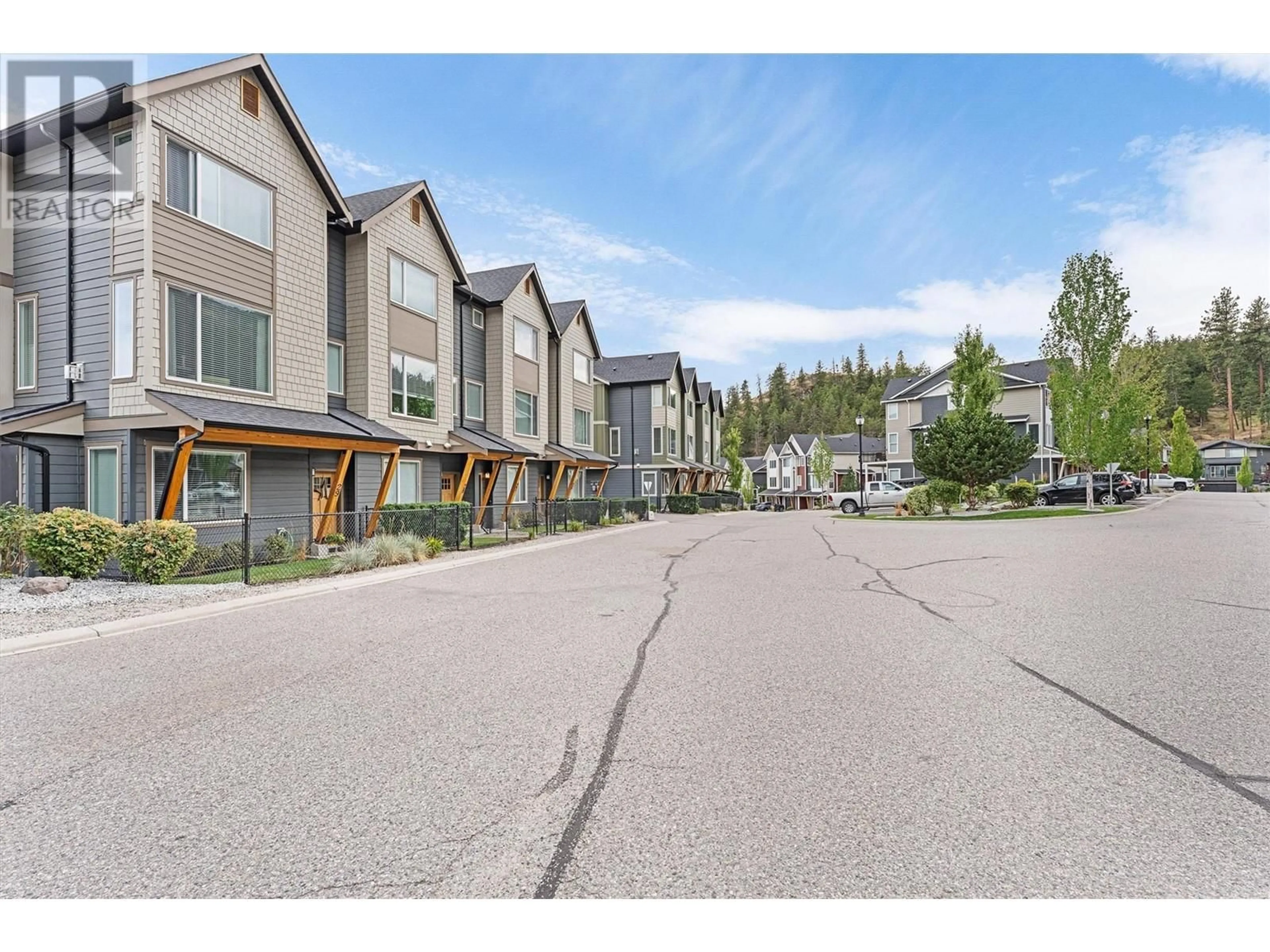 A pic from outside/outdoor area/front of a property/back of a property/a pic from drone, mountain view for 26 - 2490 TUSCANY DRIVE, West Kelowna British Columbia V4T3B6