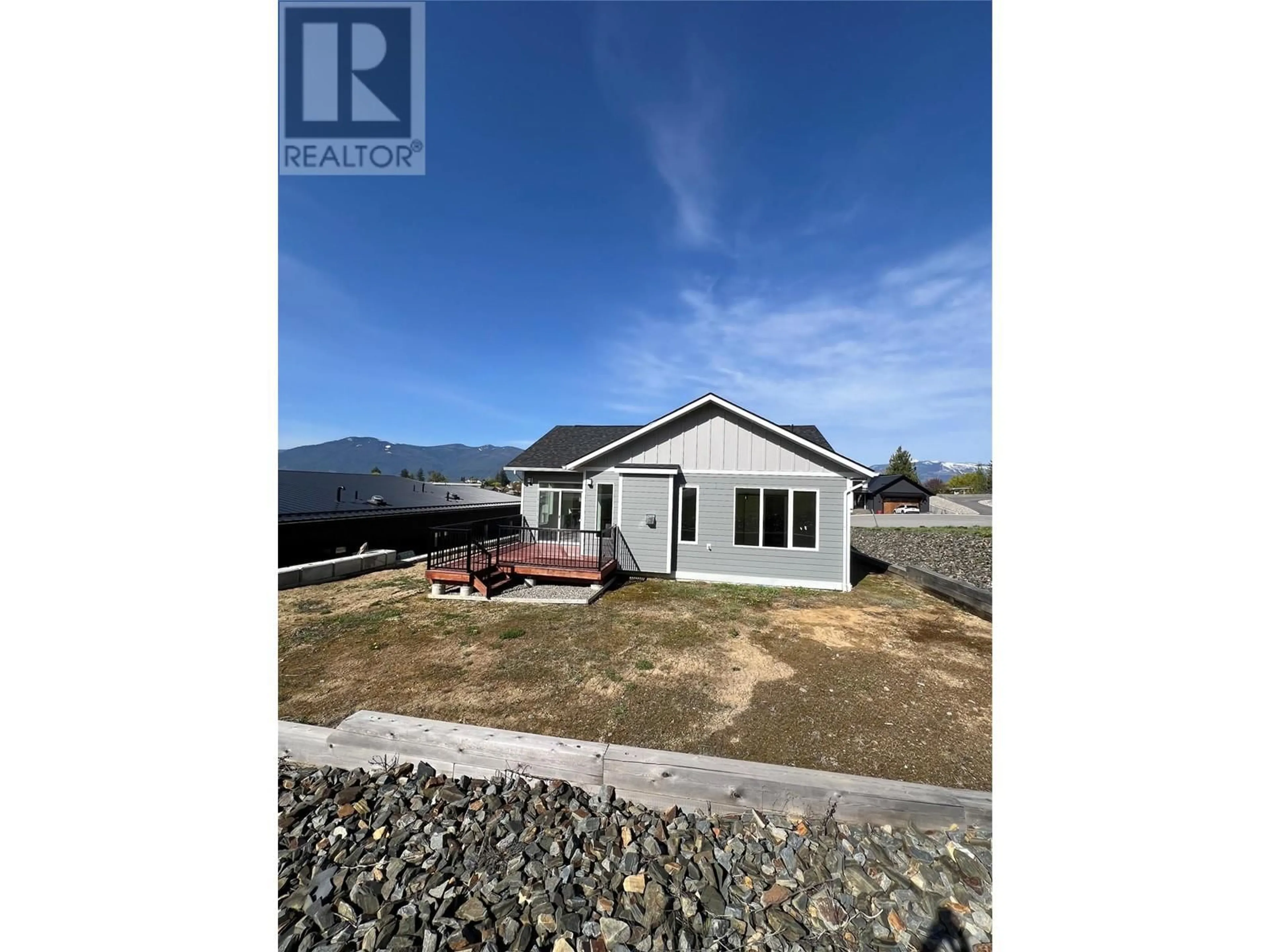 A pic from outside/outdoor area/front of a property/back of a property/a pic from drone, water/lake/river/ocean view for 712 MOUNTAIN VIEW CRESCENT, Creston British Columbia V0B1G5