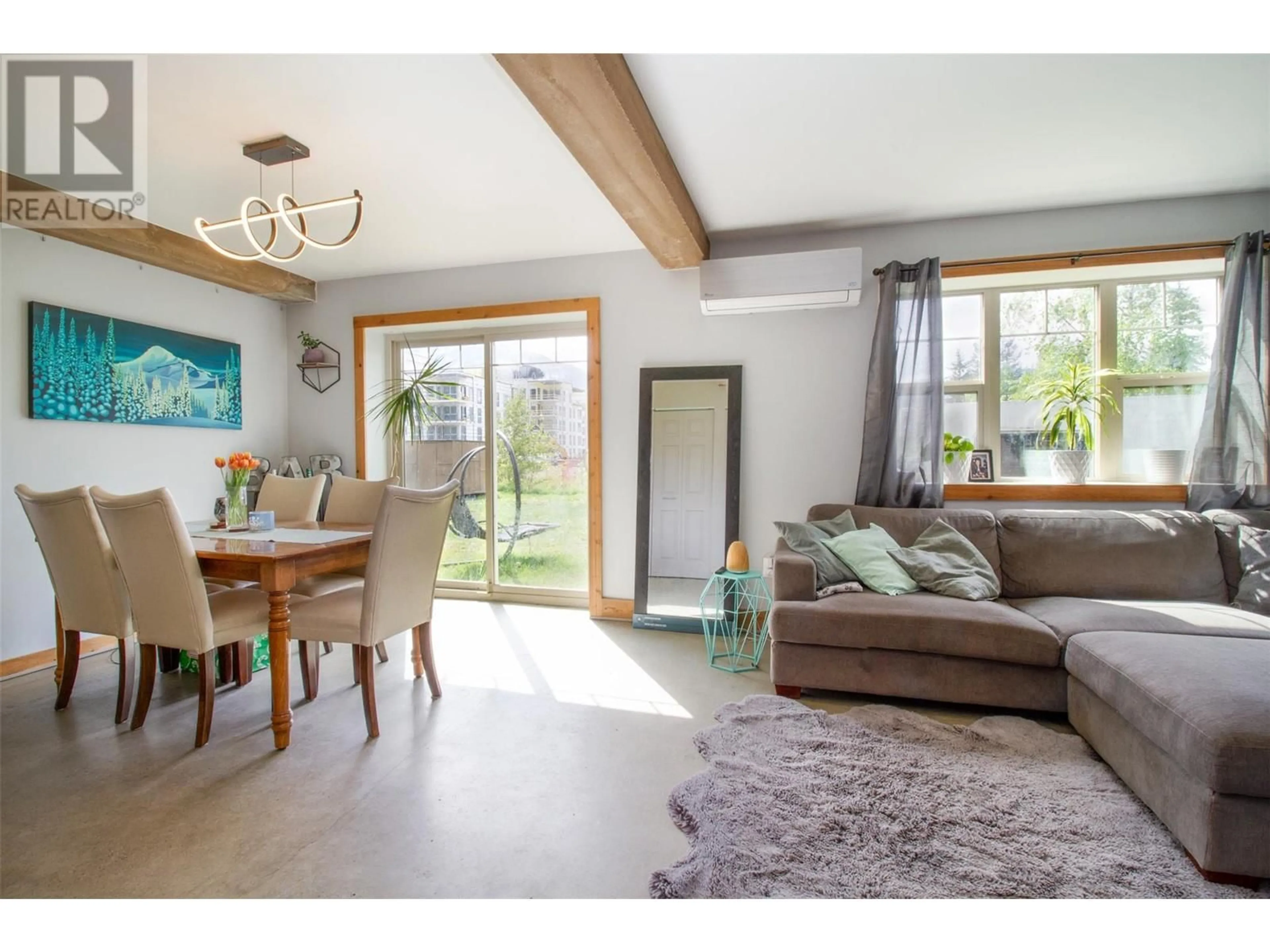 Living room with furniture, wood/laminate floor for 1905 HAY ROAD, Revelstoke British Columbia V0E2S1