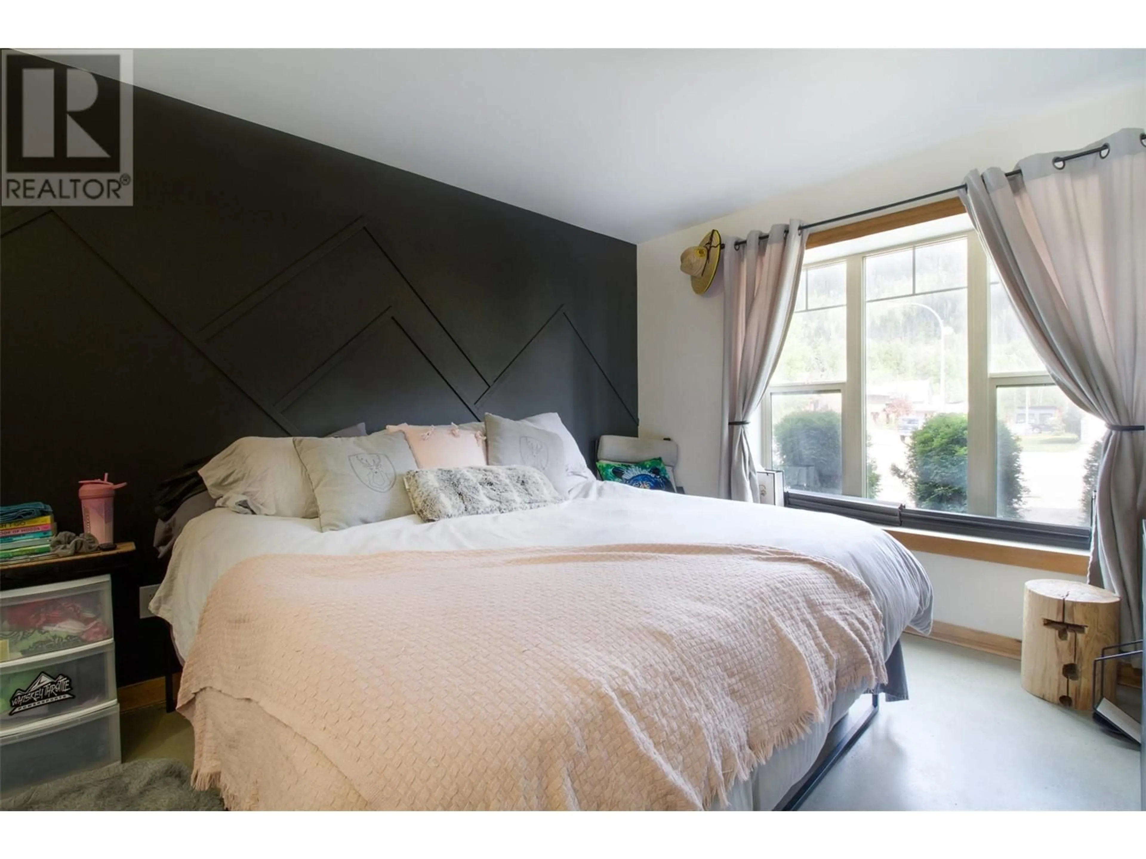 Bedroom with bed, wood/laminate floor for 1905 HAY ROAD, Revelstoke British Columbia V0E2S1
