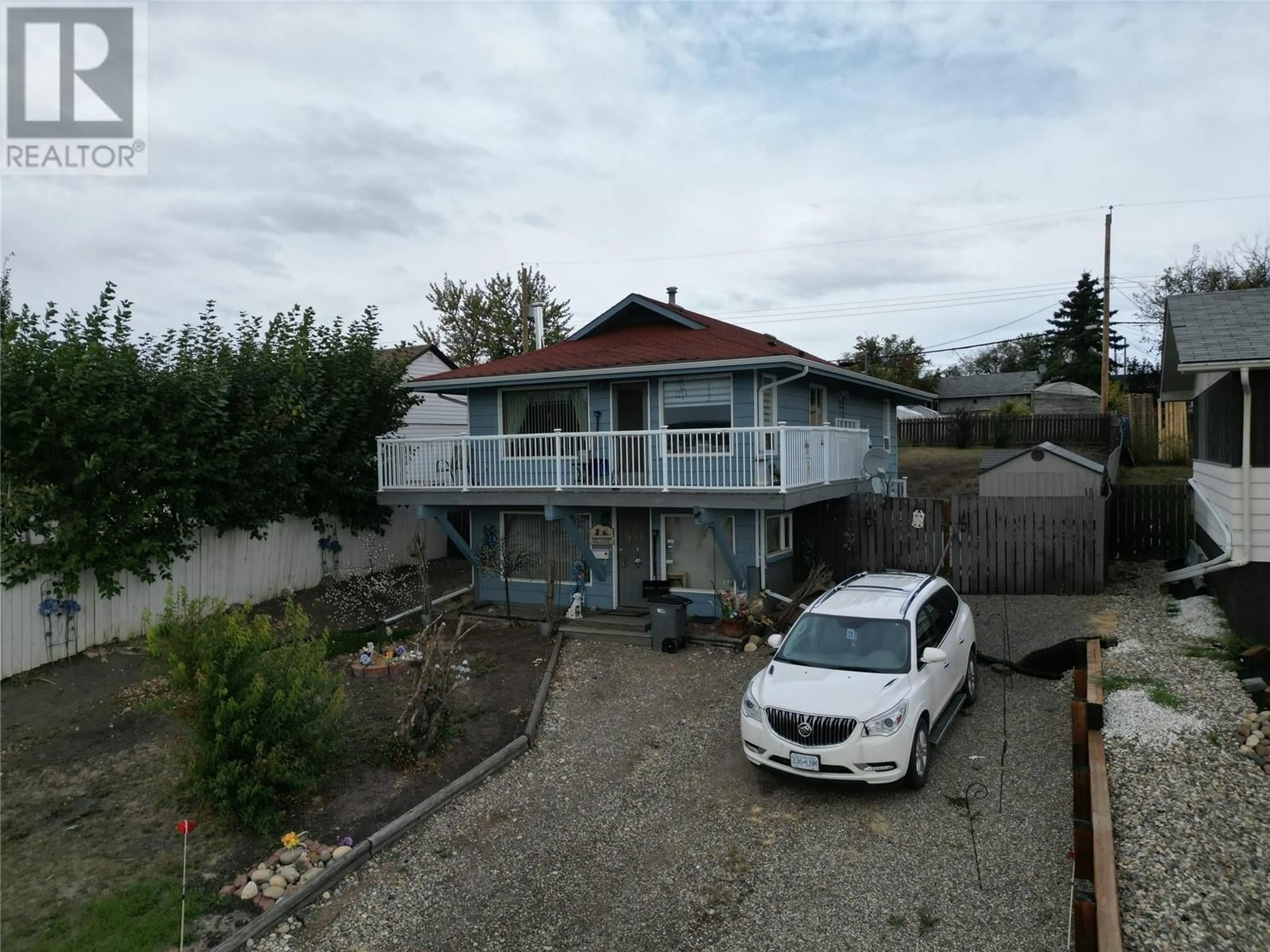 A pic from outside/outdoor area/front of a property/back of a property/a pic from drone, unknown for 352 100B AVENUE, Dawson Creek British Columbia V1G1Y1