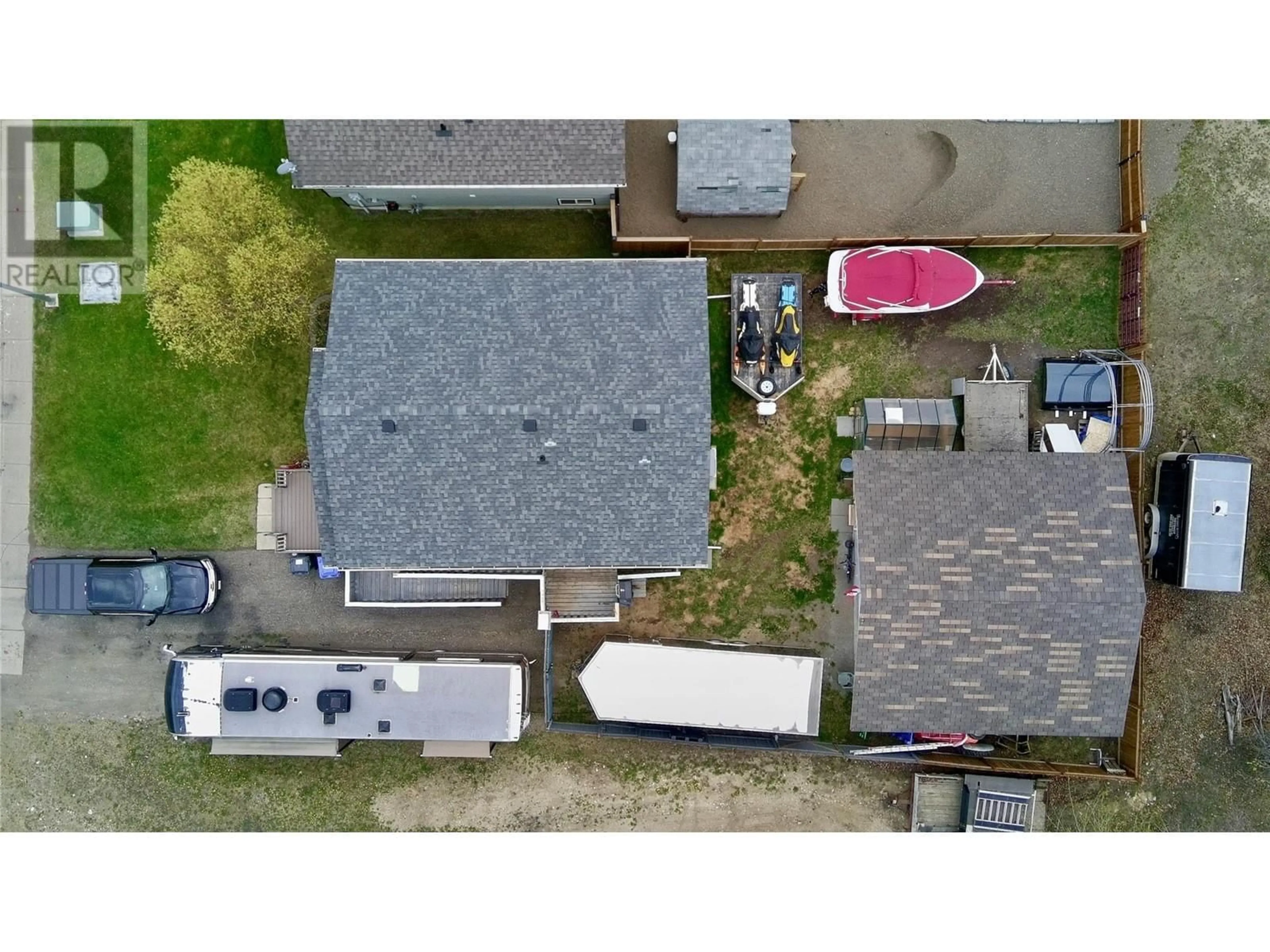 A pic from outside/outdoor area/front of a property/back of a property/a pic from drone, street for 77 WOLVERINE AVENUE, Tumbler Ridge British Columbia V0C2W0