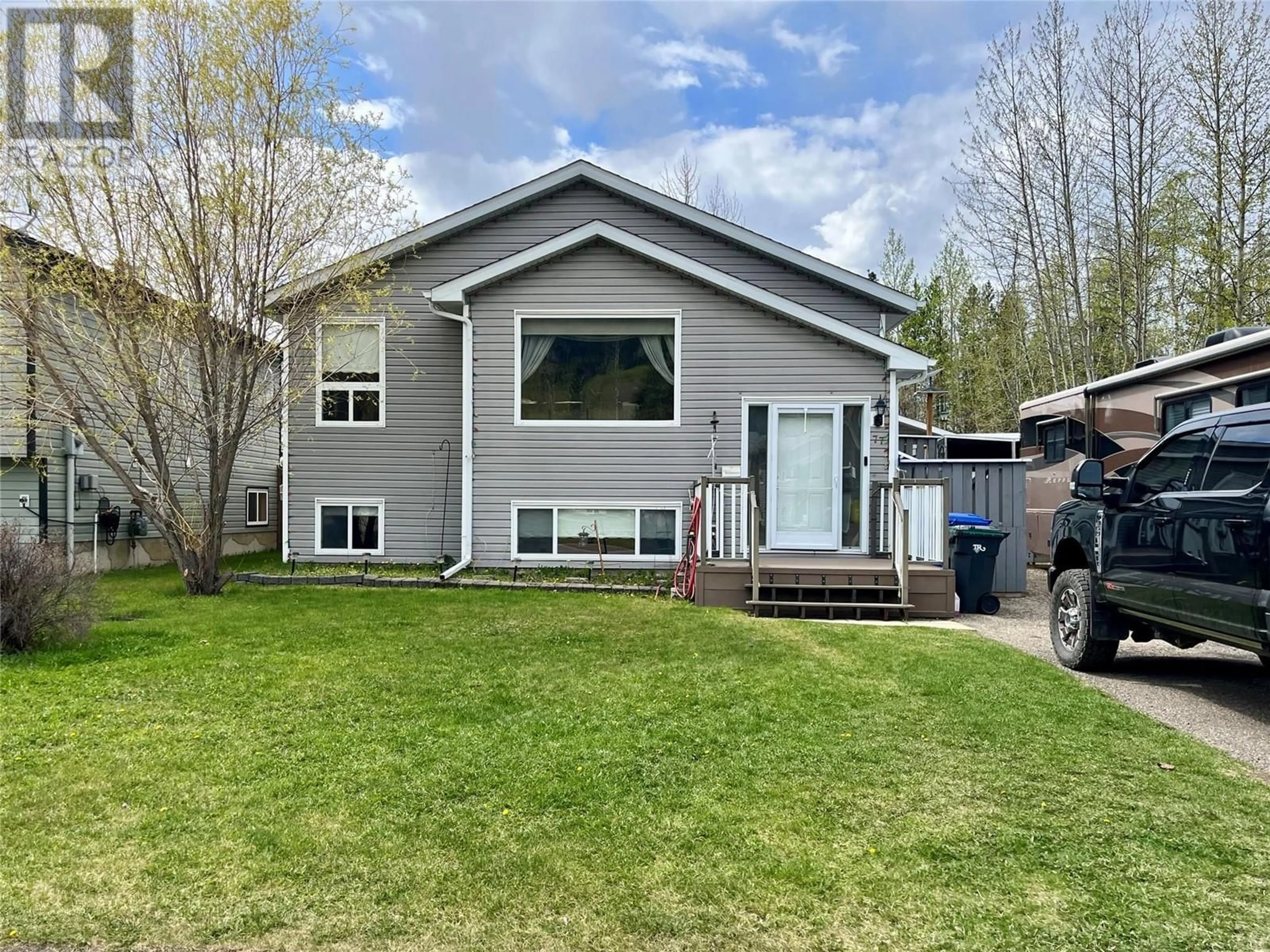 Home with vinyl exterior material, street for 77 WOLVERINE AVENUE, Tumbler Ridge British Columbia V0C2W0