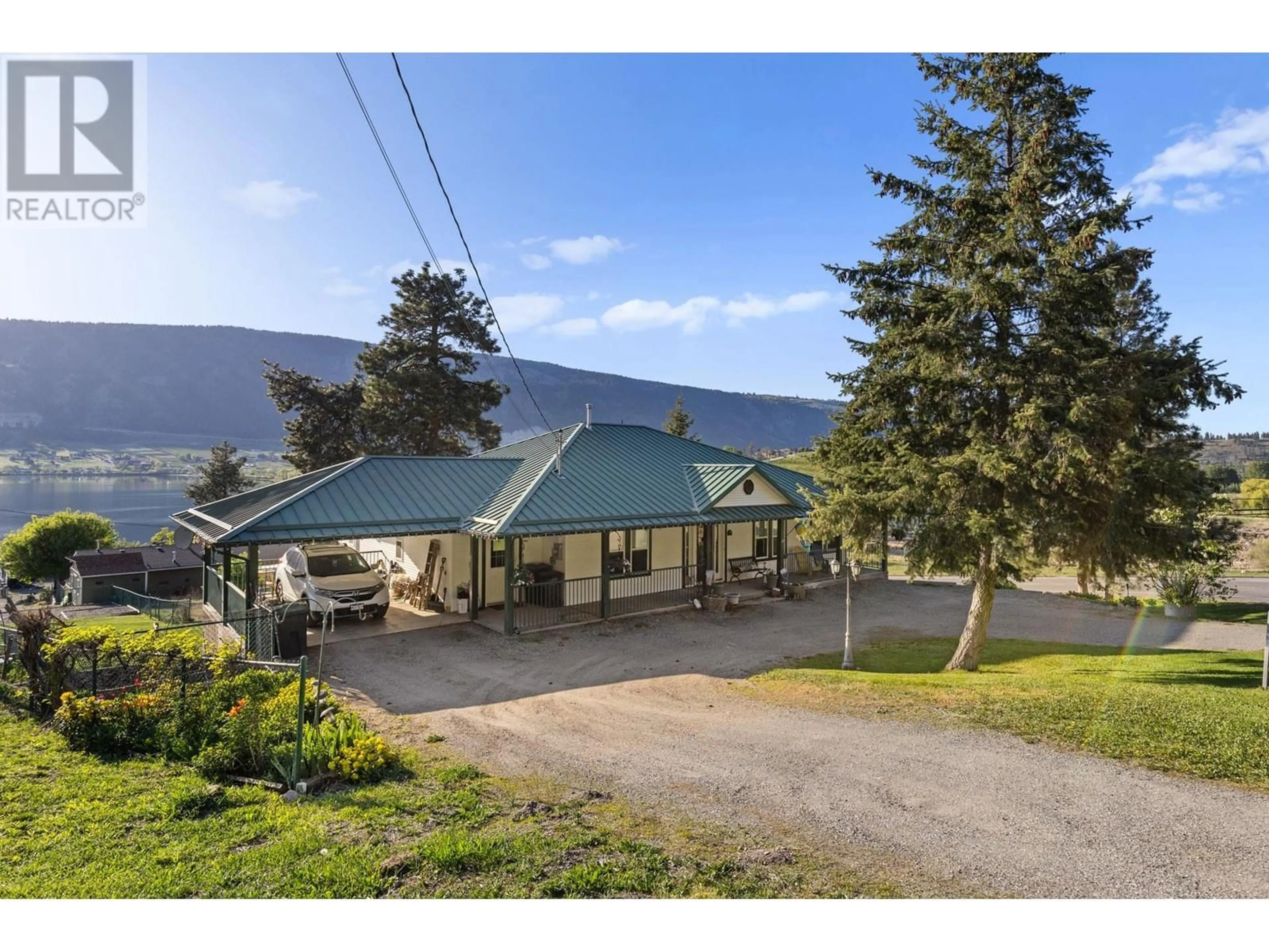 A pic from outside/outdoor area/front of a property/back of a property/a pic from drone, mountain view for 15326 OYAMA ROAD, Lake Country British Columbia V4V2C5