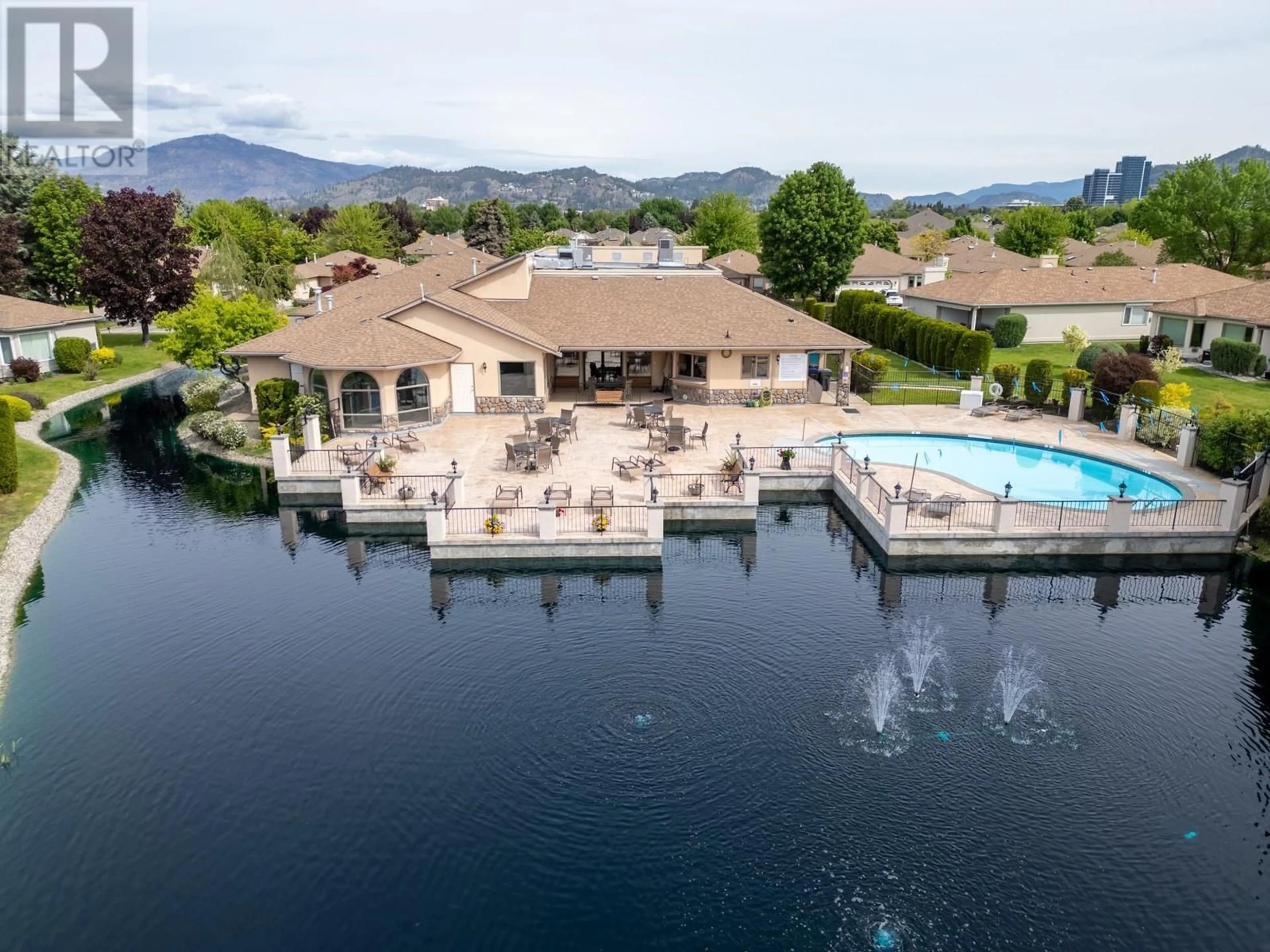 A pic from outside/outdoor area/front of a property/back of a property/a pic from drone, water/lake/river/ocean view for 23 - 1201 CAMERON AVENUE, Kelowna British Columbia V1W3R7