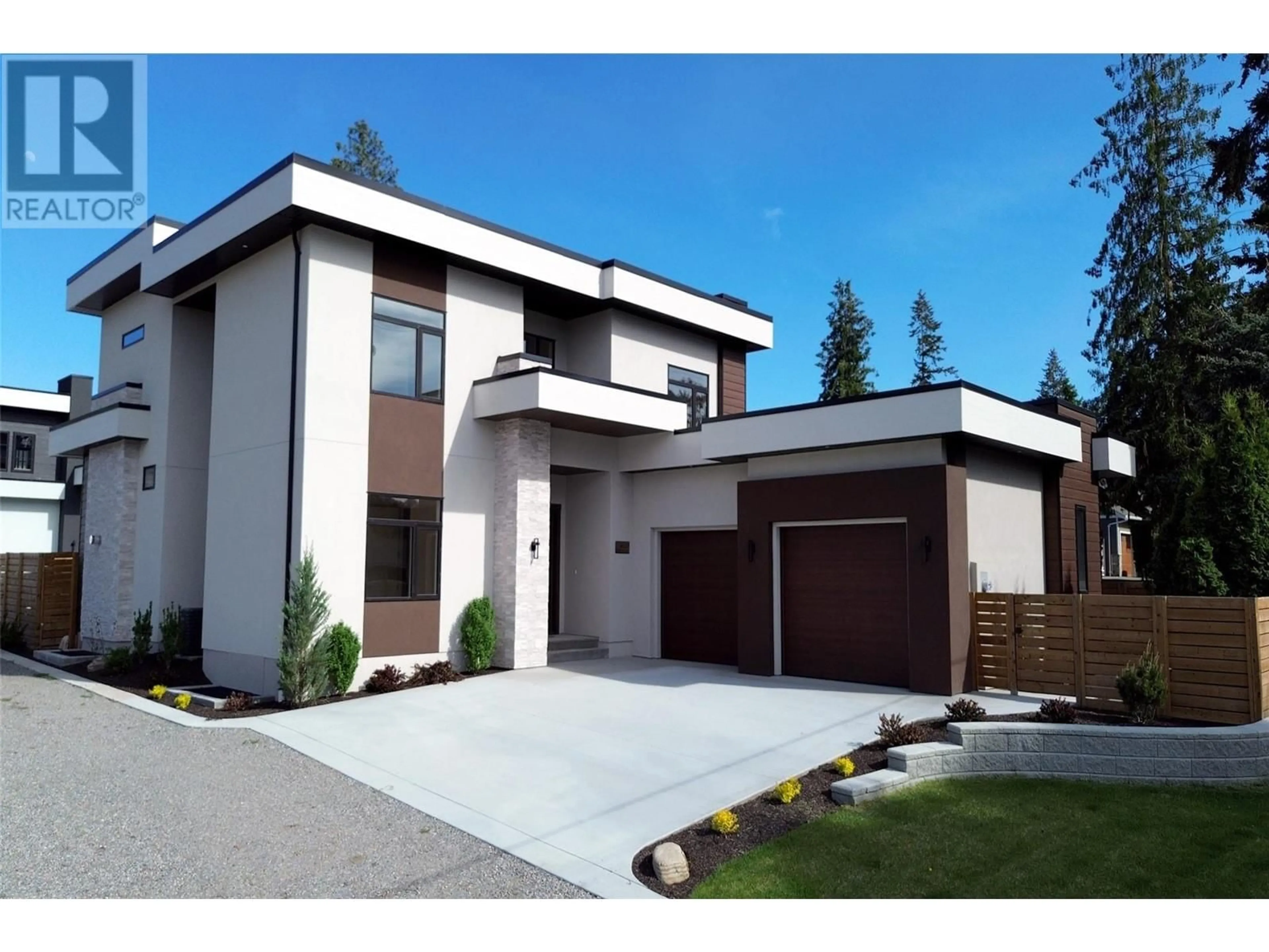 Home with vinyl exterior material, street for 4619 FORDHAM ROAD, Kelowna British Columbia V1W1P1