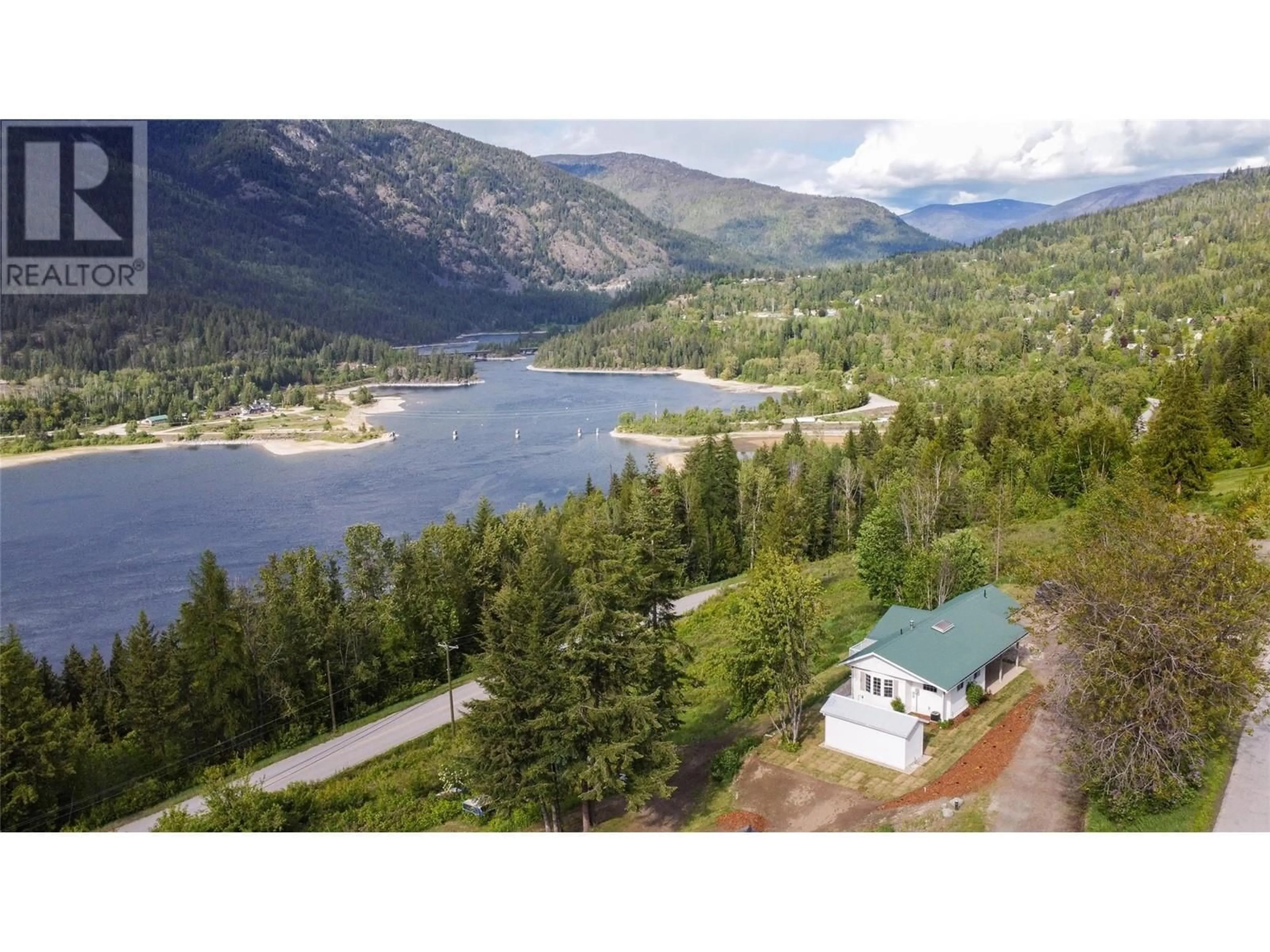 A pic from outside/outdoor area/front of a property/back of a property/a pic from drone, water/lake/river/ocean view for 3288 VINDUSKY ROAD, Nelson British Columbia V1L6X7