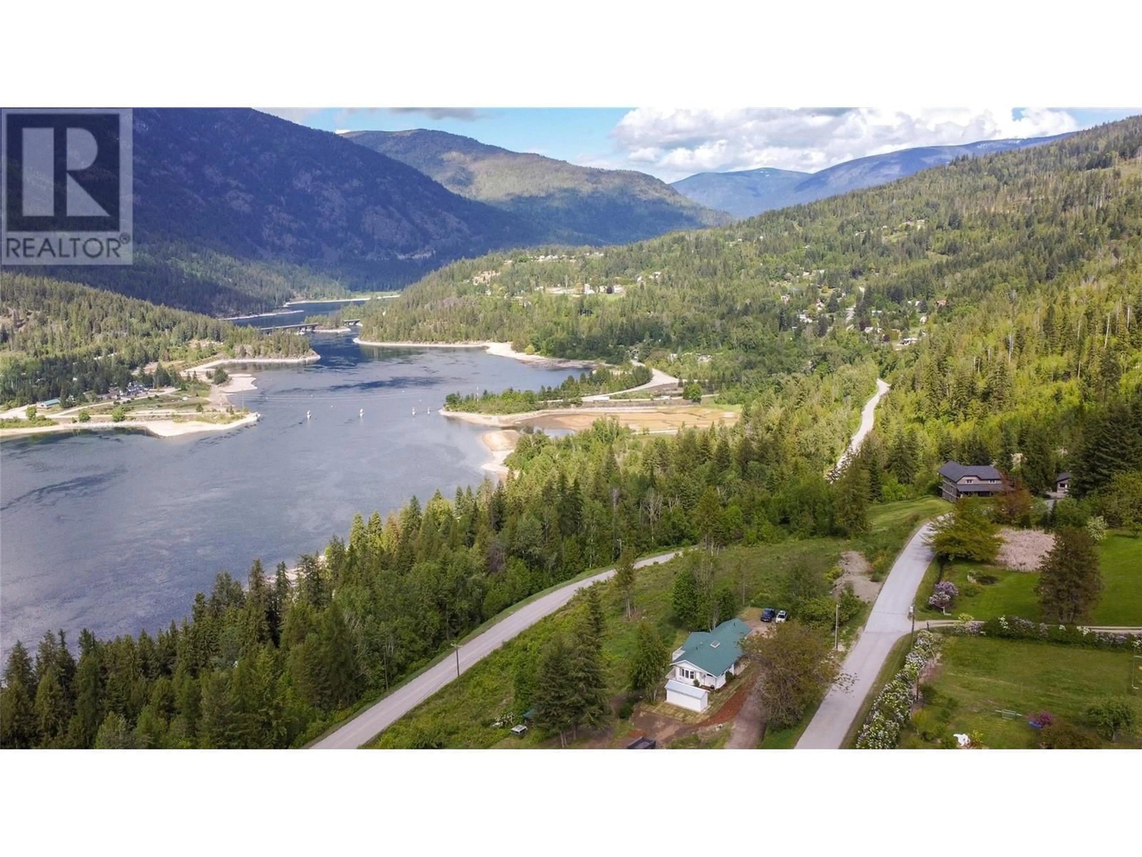 A pic from outside/outdoor area/front of a property/back of a property/a pic from drone, water/lake/river/ocean view for 3288 VINDUSKY ROAD, Nelson British Columbia V1L6X7