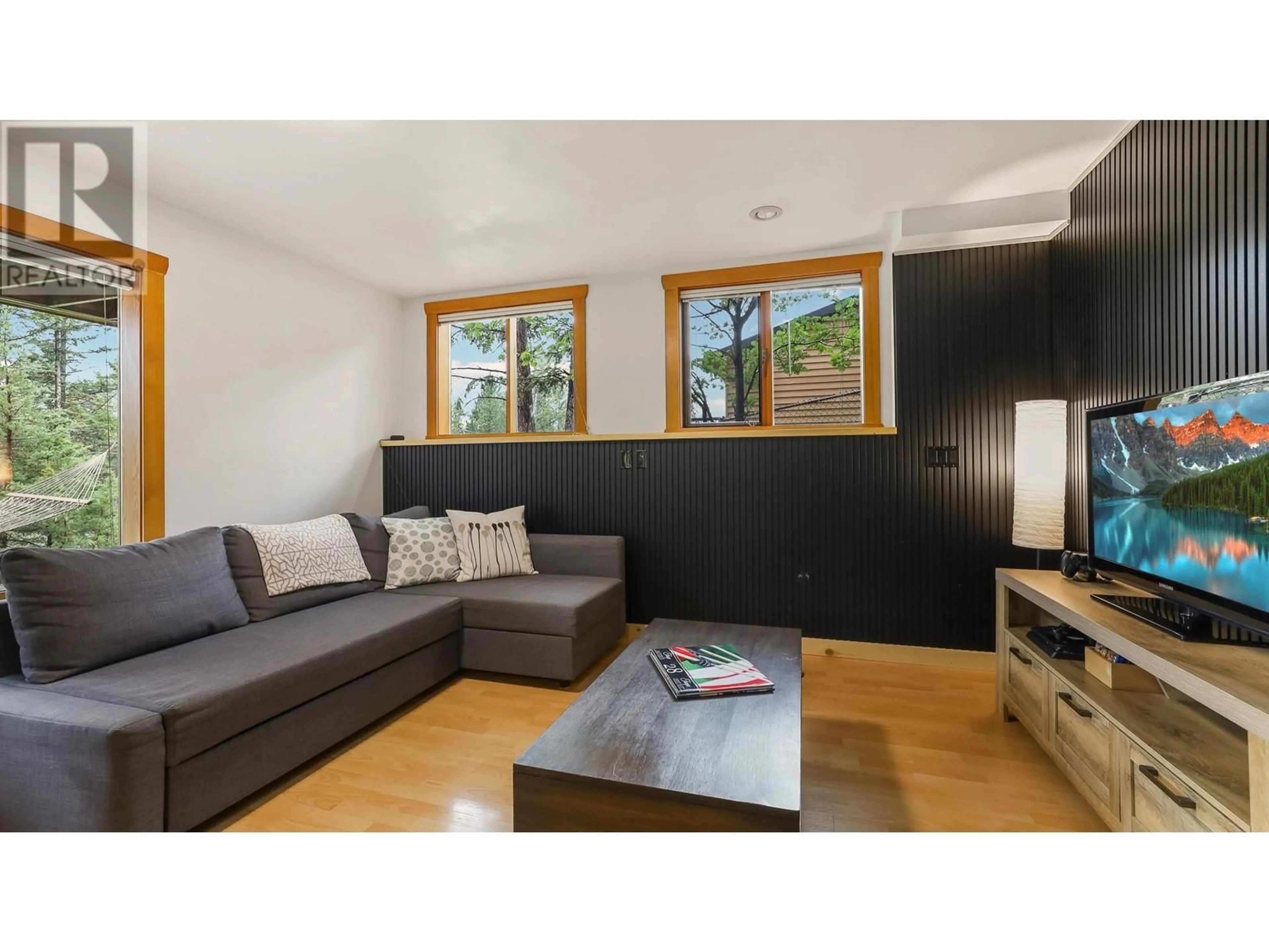 Living room with furniture, wood/laminate floor for 1602 11TH AVENUE, Invermere British Columbia V0A1K4