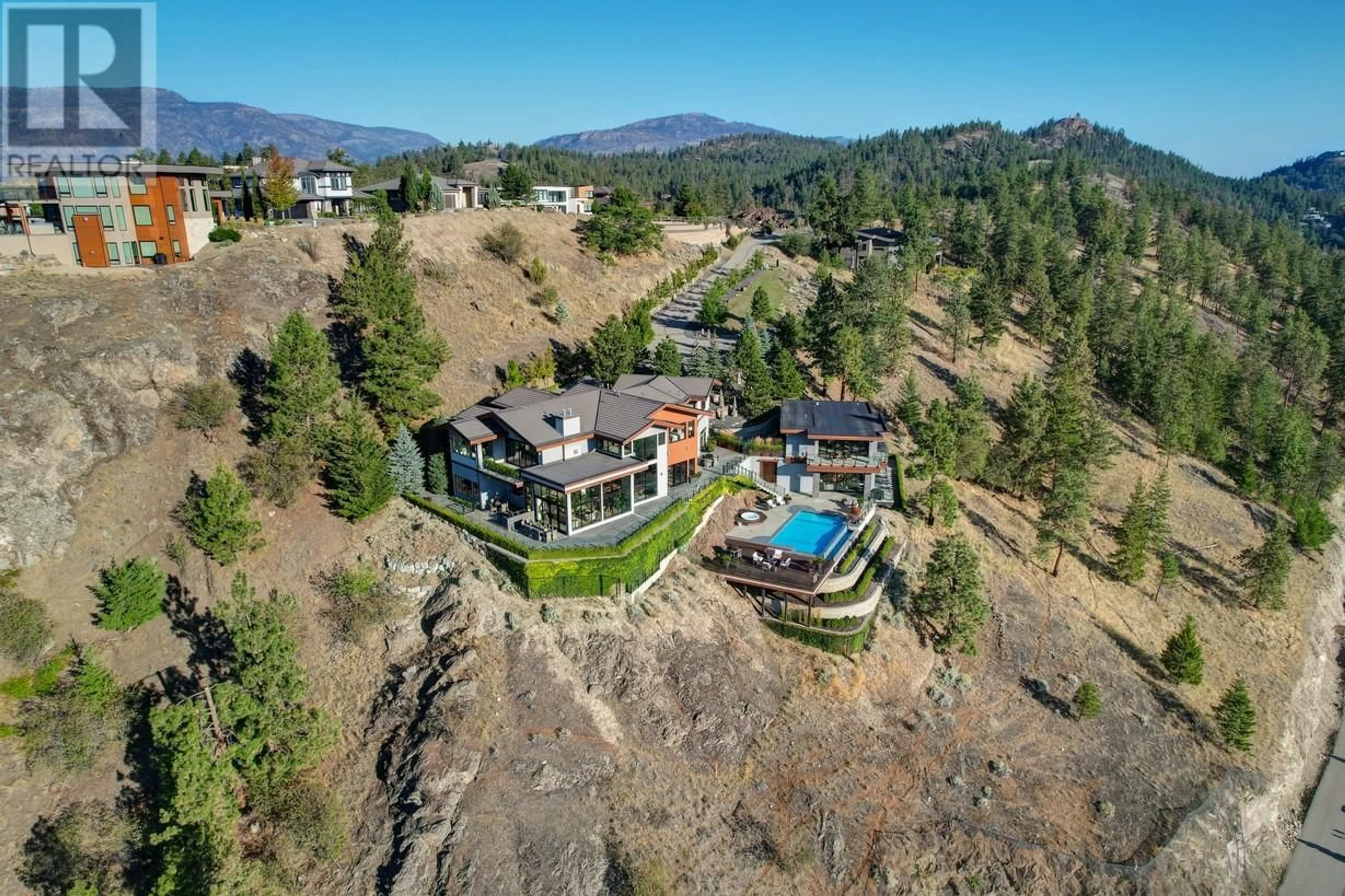 A pic from outside/outdoor area/front of a property/back of a property/a pic from drone, mountain view for 733 FORESTRIDGE LANE, Kelowna British Columbia V6E0C5