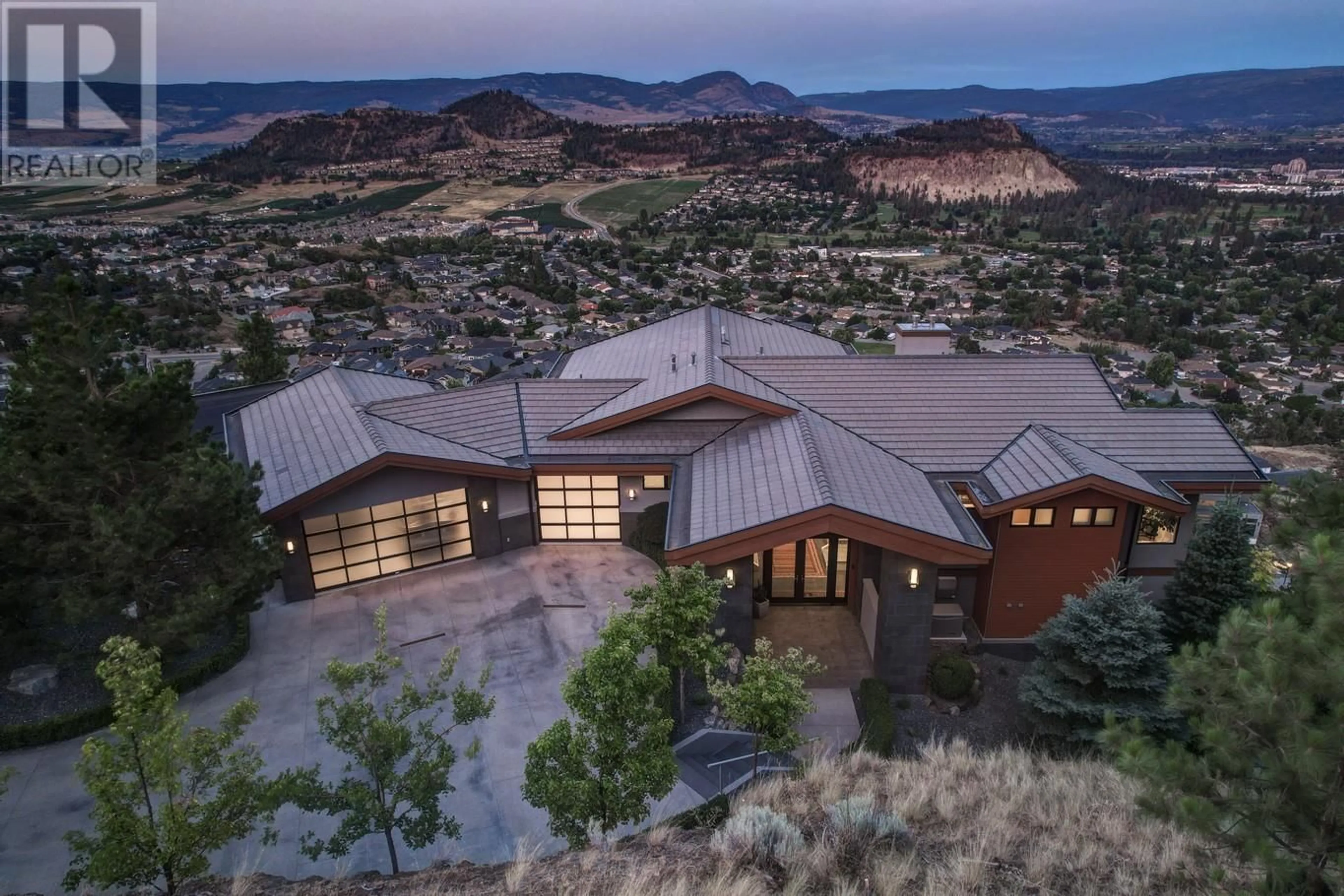 A pic from outside/outdoor area/front of a property/back of a property/a pic from drone, mountain view for 733 FORESTRIDGE LANE, Kelowna British Columbia V6E0C5