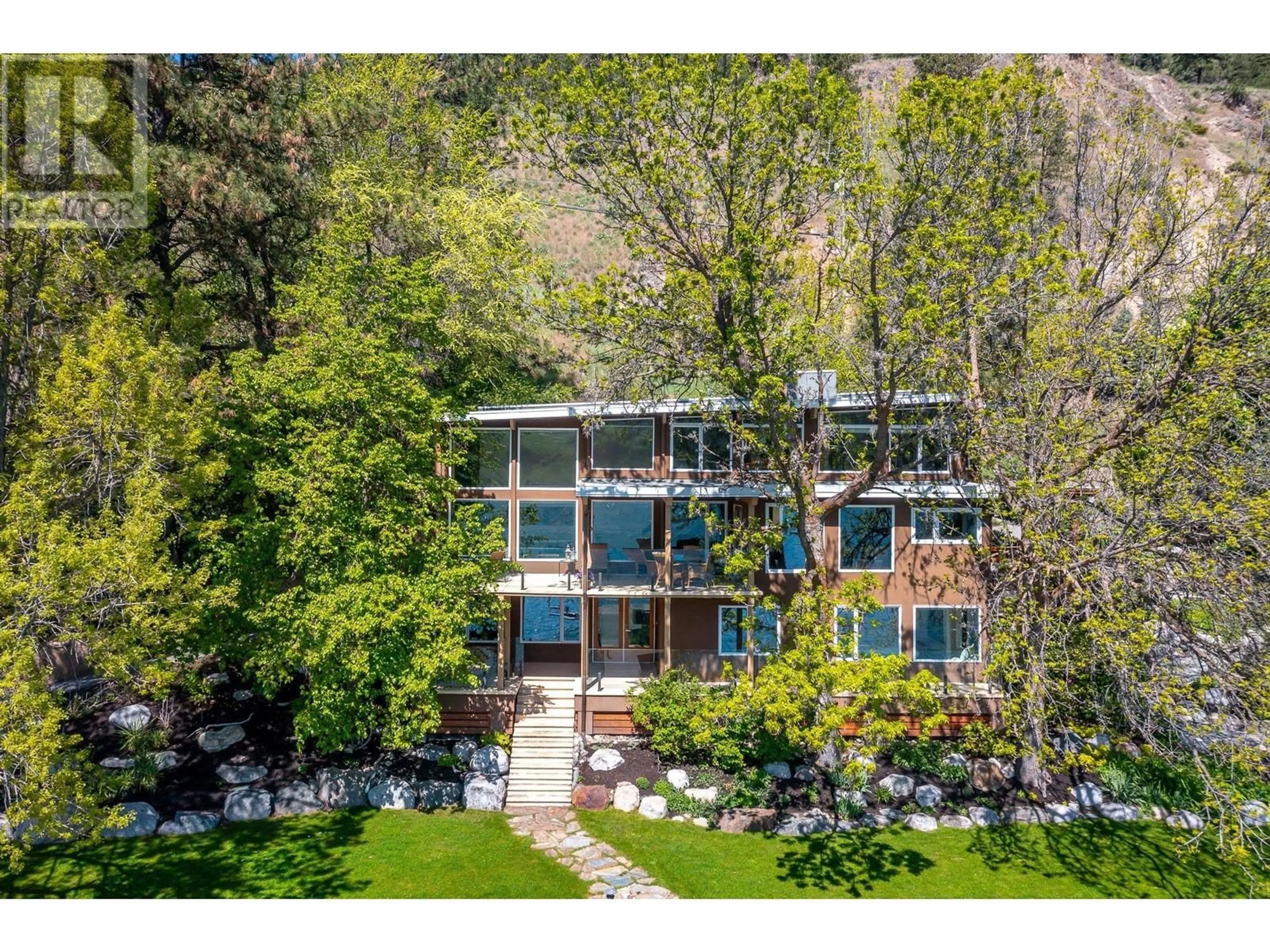 A pic from outside/outdoor area/front of a property/back of a property/a pic from drone, unknown for 8280 TRONSON ROAD, Vernon British Columbia V1H1C8