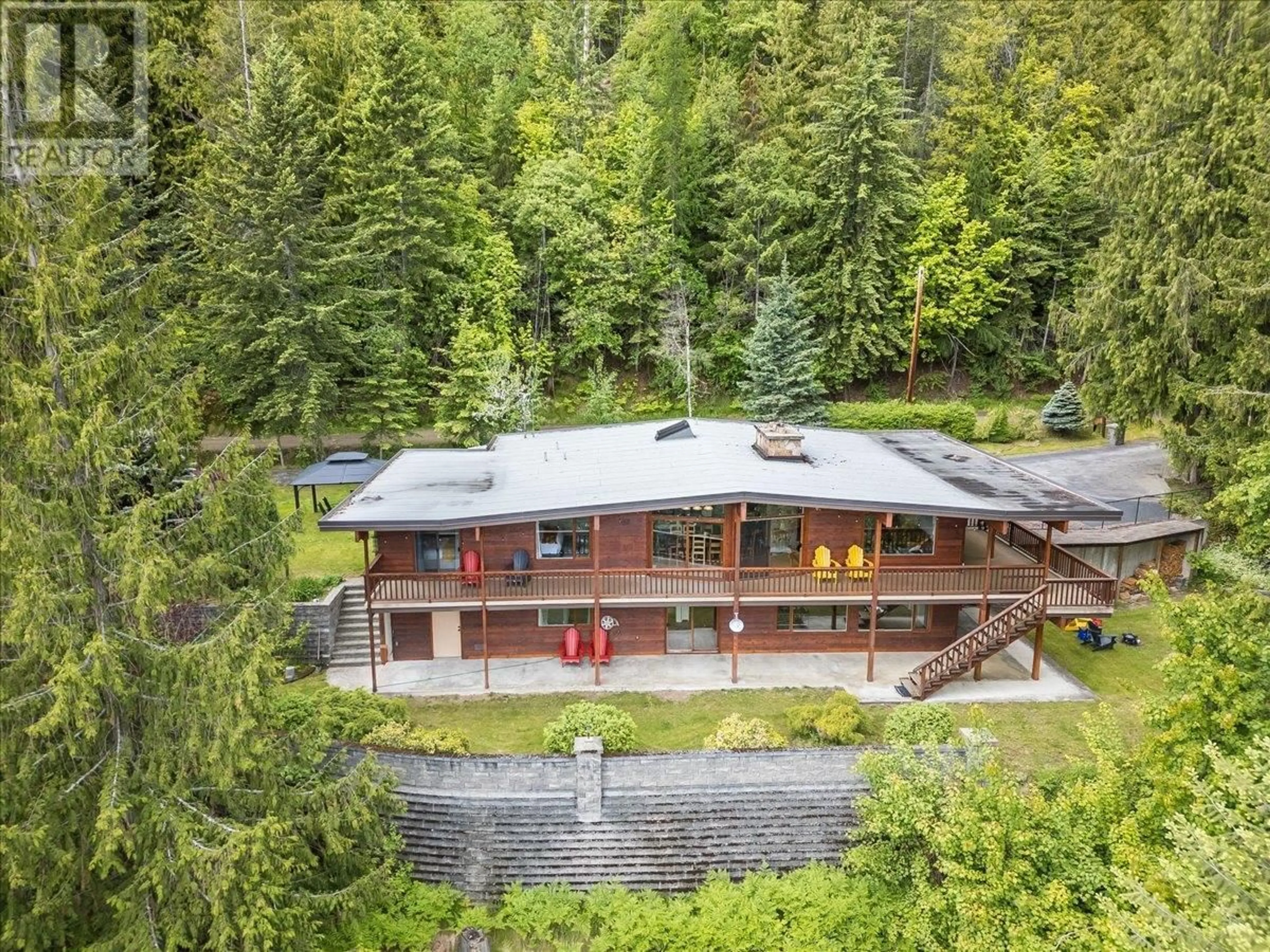 A pic from outside/outdoor area/front of a property/back of a property/a pic from drone, forest/trees view for 3450 DAVIDSON ROAD, Ainsworth British Columbia V0G1A0