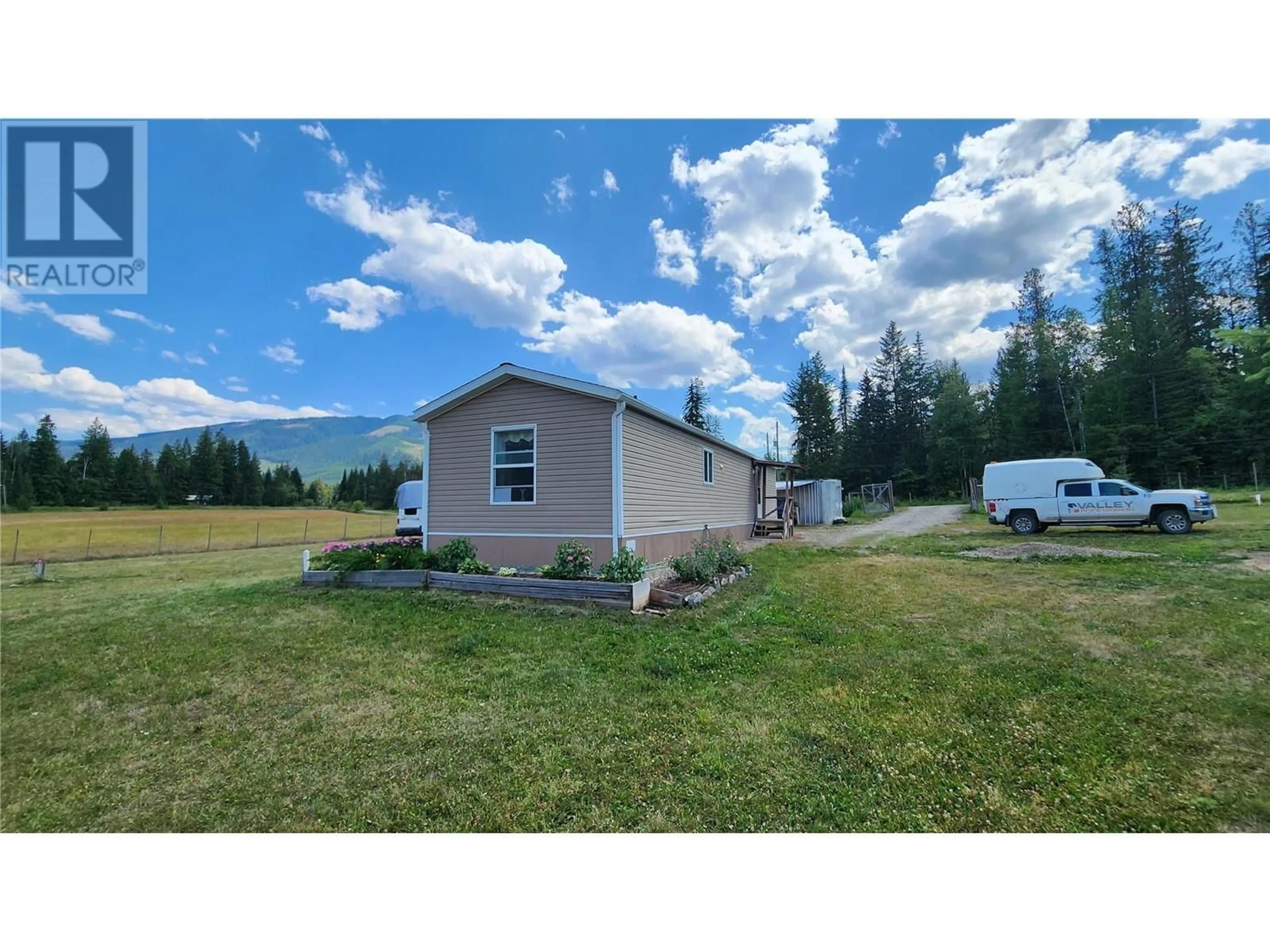 A pic from outside/outdoor area/front of a property/back of a property/a pic from drone, water/lake/river/ocean view for 3237 CREIGHTON VALLEY ROAD, Cherryville British Columbia V0E2G3