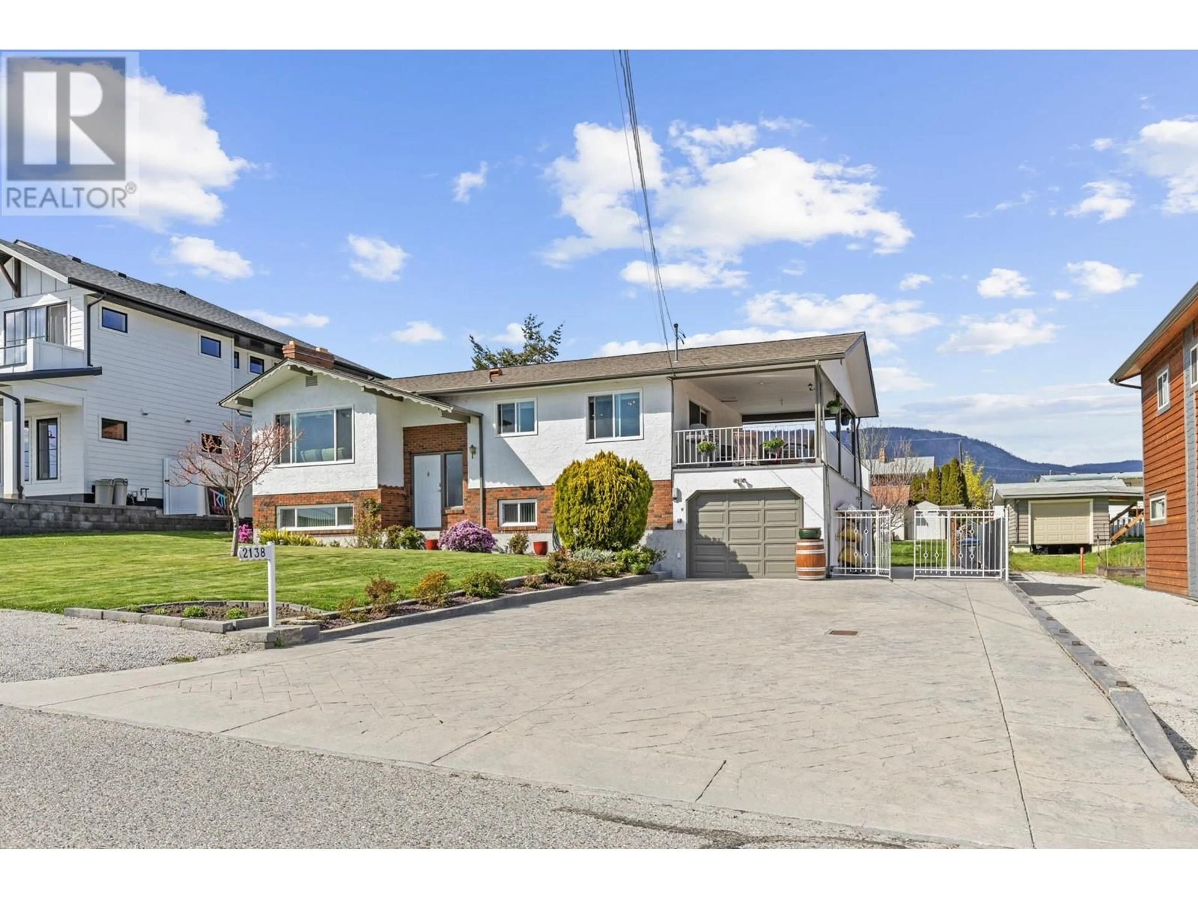A pic from outside/outdoor area/front of a property/back of a property/a pic from drone, mountain view for 2138 WITT ROAD, West Kelowna British Columbia V4T2C4