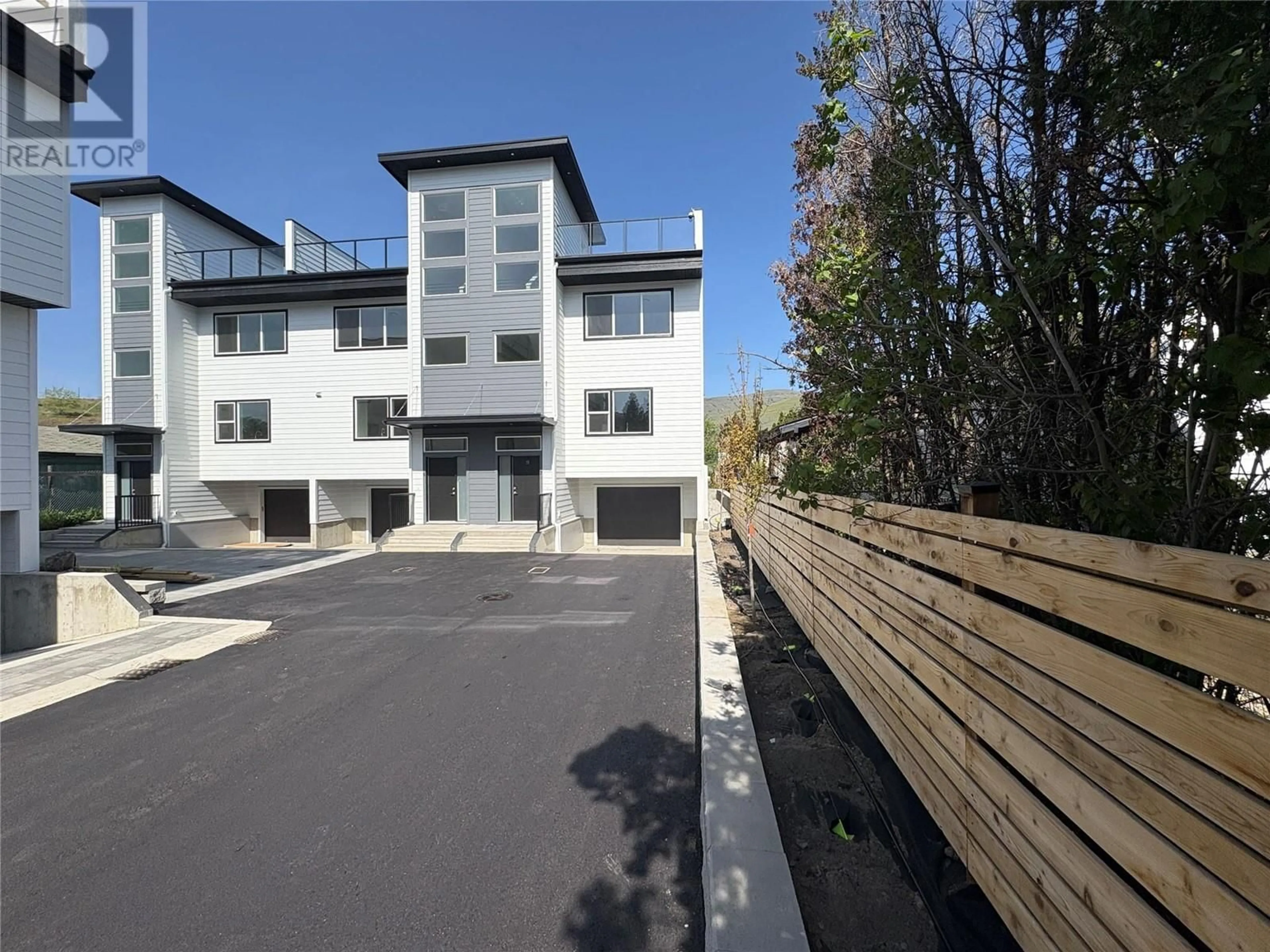 A pic from outside/outdoor area/front of a property/back of a property/a pic from drone, building for 6 - 5661 OKANAGAN LANDING ROAD, Vernon British Columbia V1T7A6