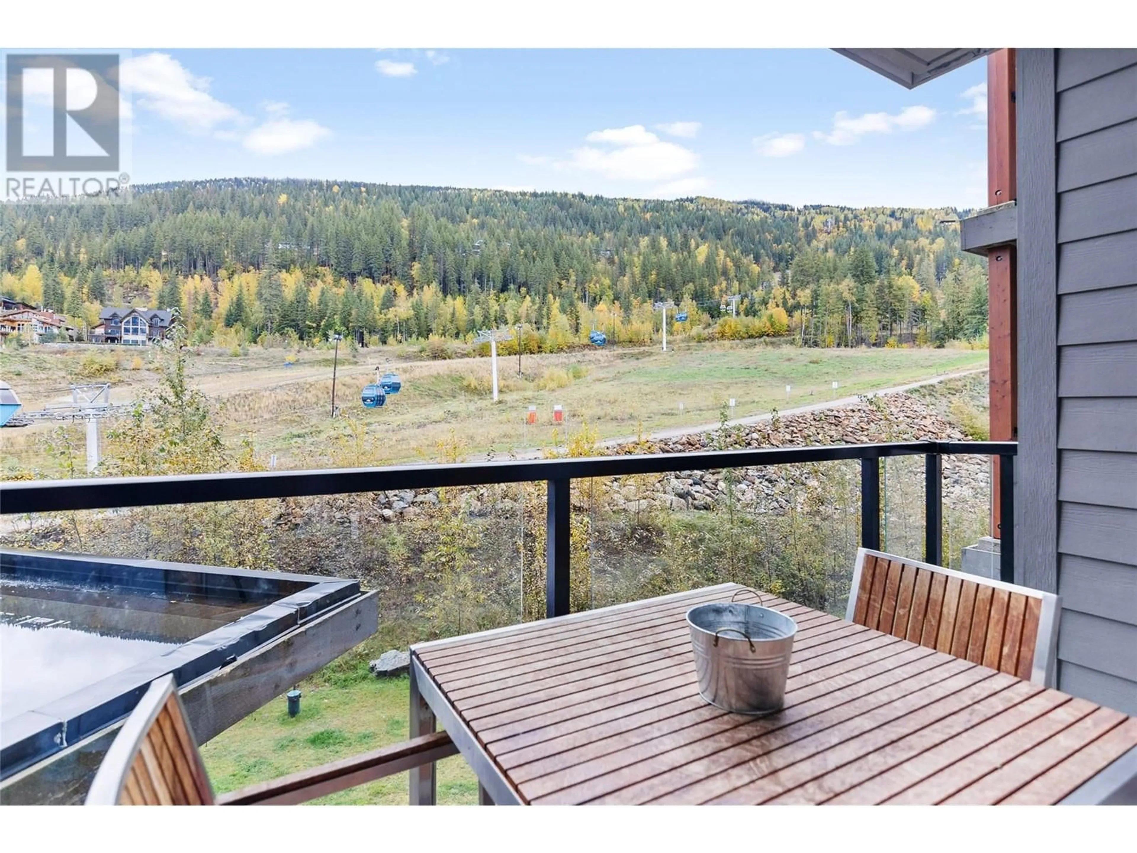 Balcony in the apartment, forest/trees view for 2427 - 2950 CAMOZZI ROAD, Revelstoke British Columbia V0E2S0