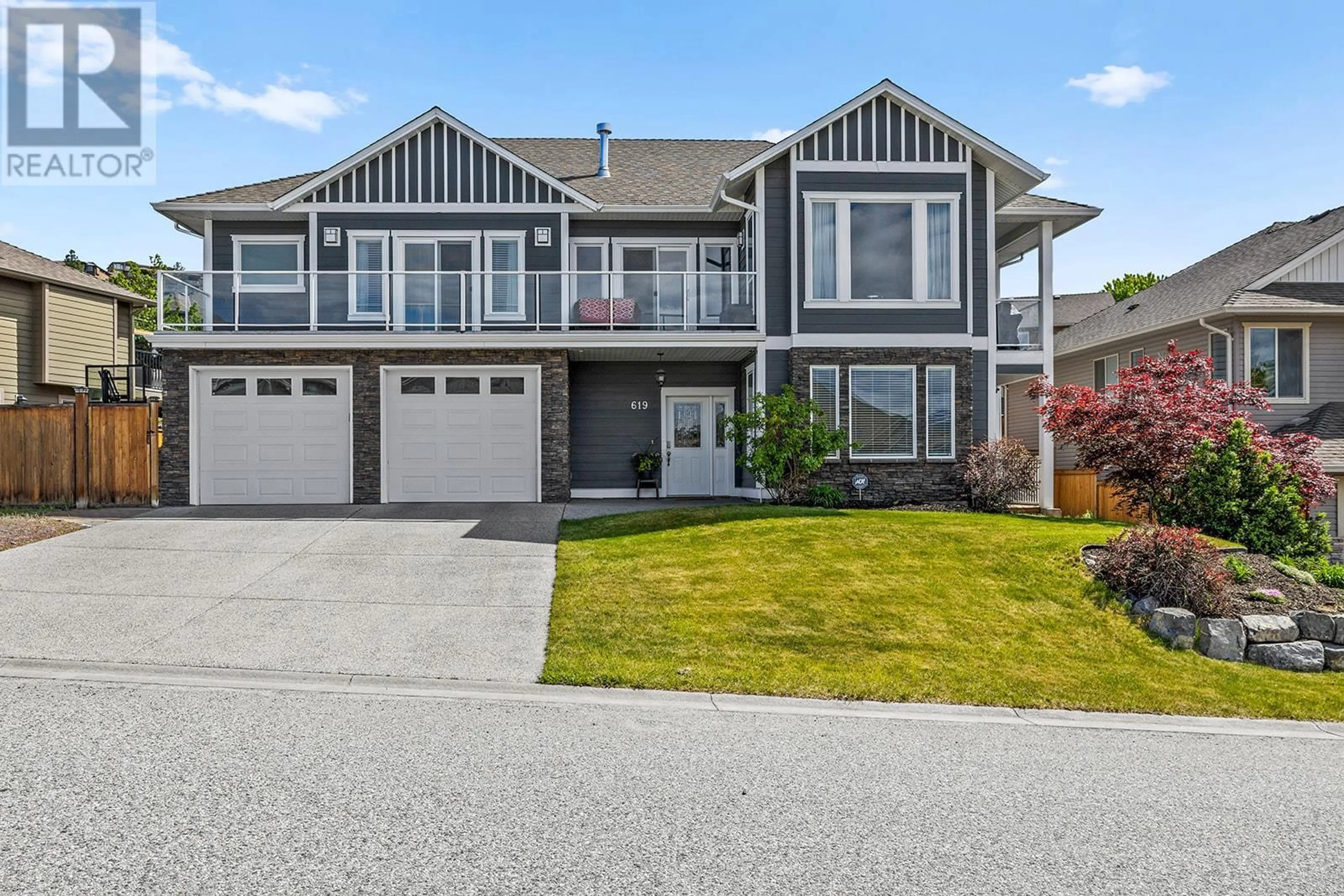 Home with vinyl exterior material, street for 619 LEFEVERE AVENUE, Kelowna British Columbia V1W5G7