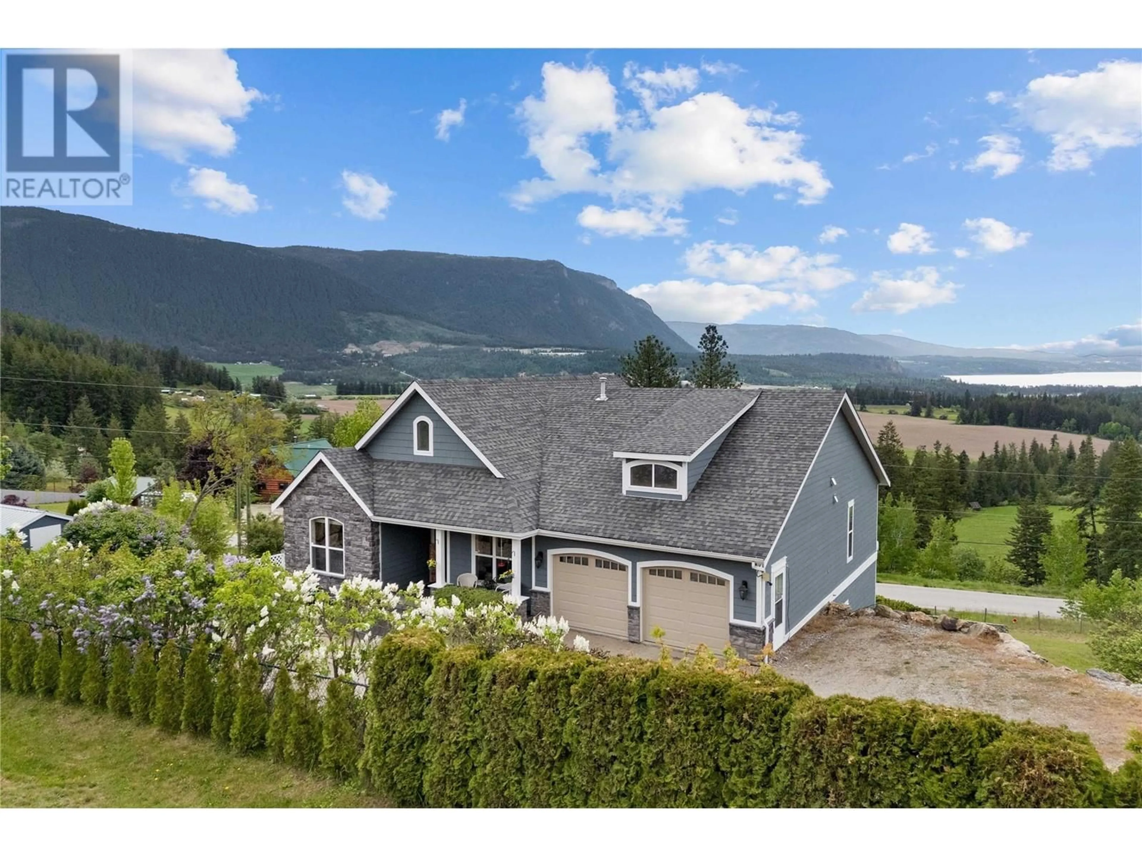 A pic from outside/outdoor area/front of a property/back of a property/a pic from drone, mountain view for 2754 SUN RIDGE PLACE, Tappen British Columbia V0E2X0