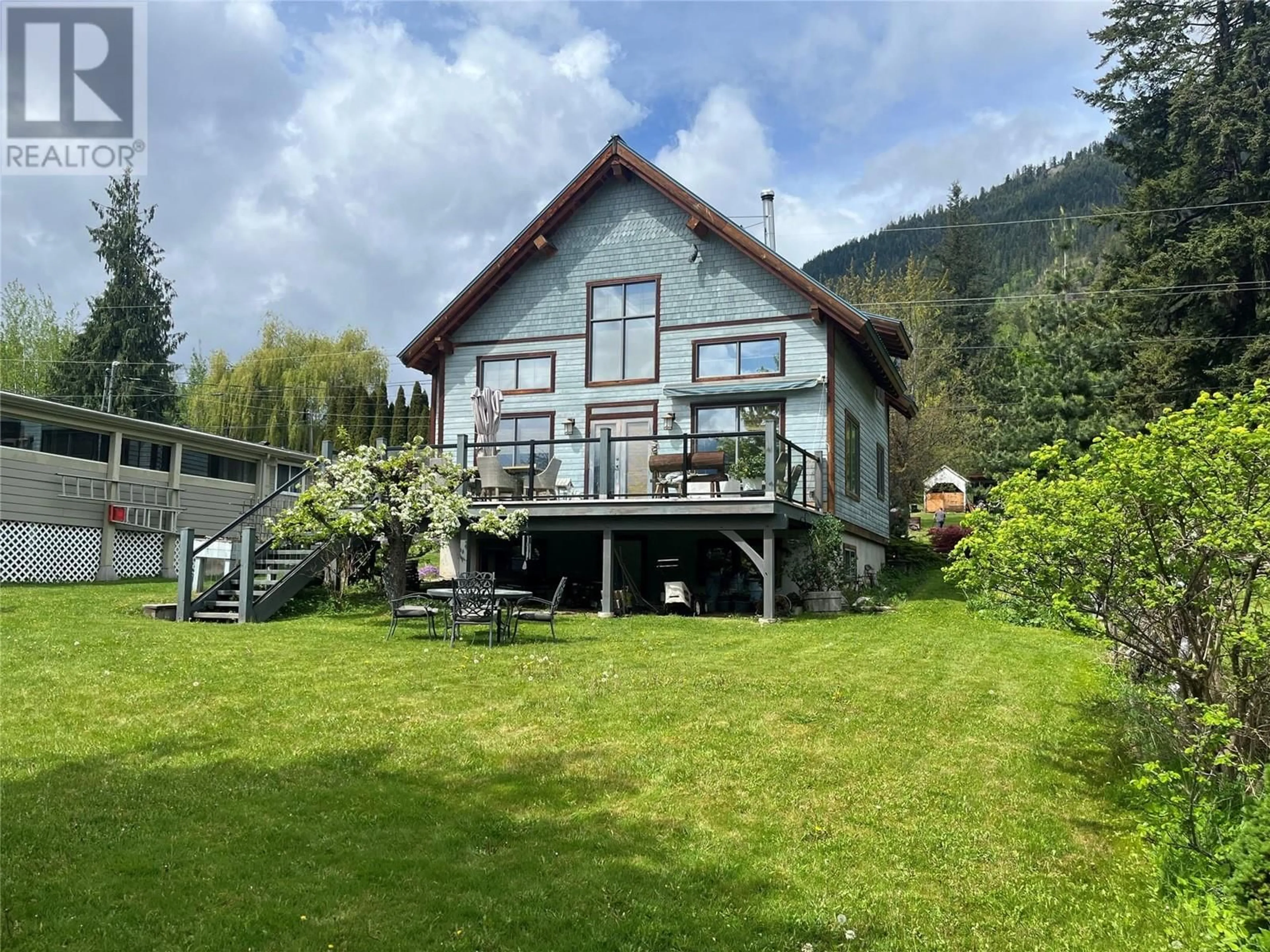 A pic from outside/outdoor area/front of a property/back of a property/a pic from drone, mountain view for 130 8TH STREET NORTH, Kaslo British Columbia V0G1M0