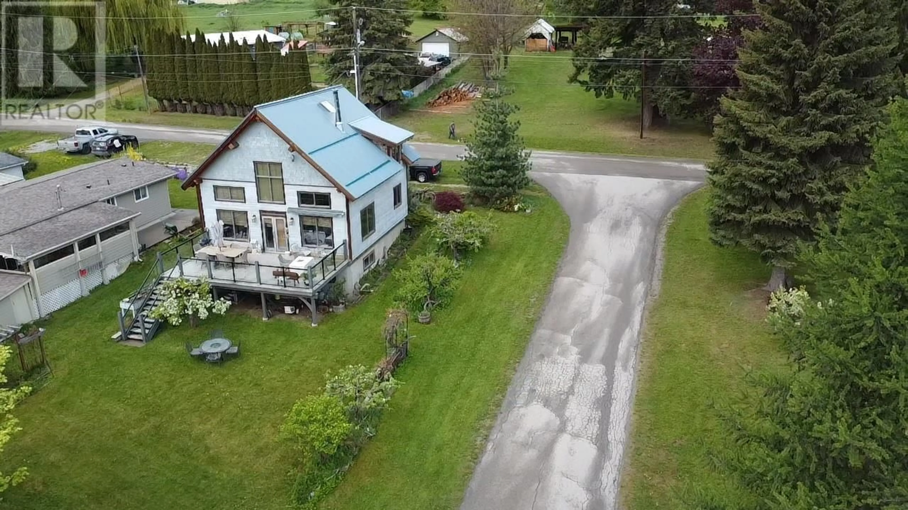 A pic from outside/outdoor area/front of a property/back of a property/a pic from drone, unknown for 130 8TH STREET NORTH, Kaslo British Columbia V0G1M0