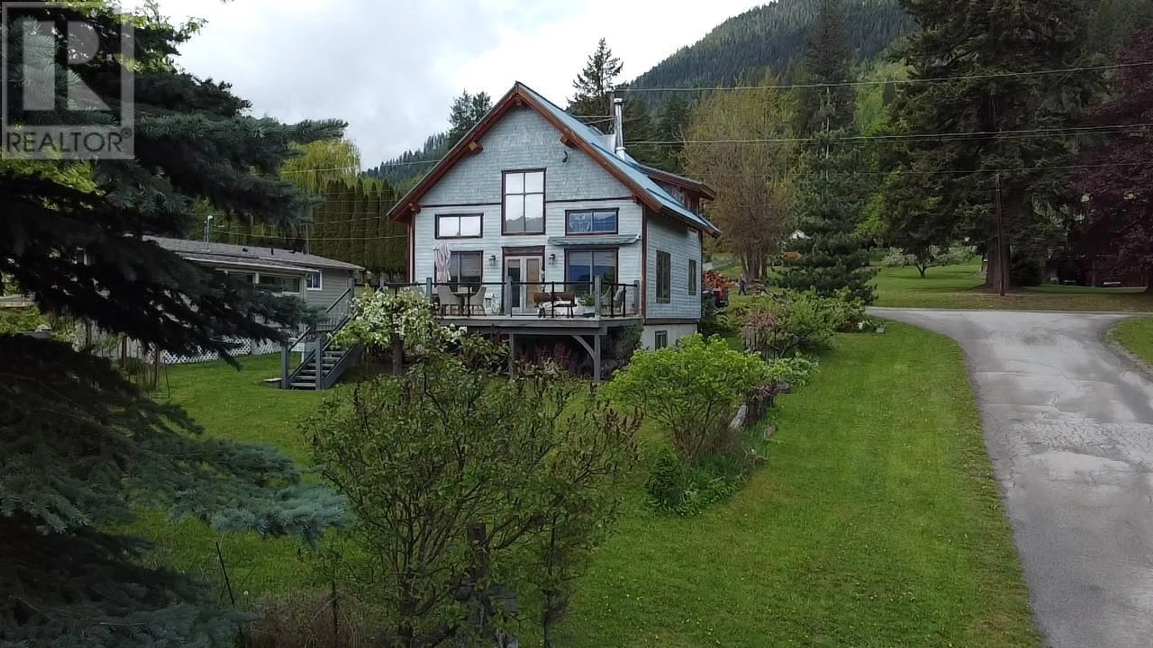 A pic from outside/outdoor area/front of a property/back of a property/a pic from drone, mountain view for 130 8TH STREET NORTH, Kaslo British Columbia V0G1M0