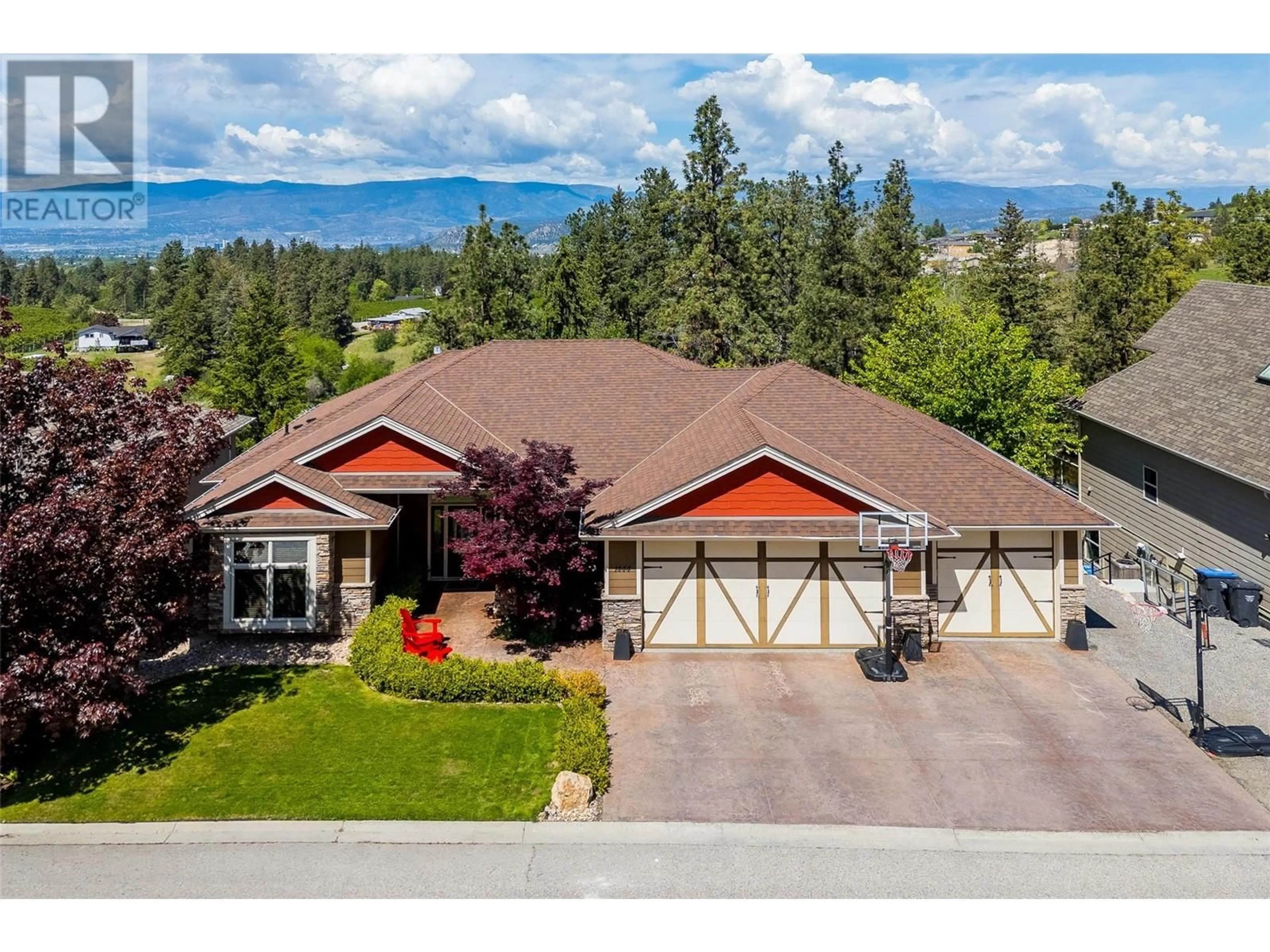 A pic from outside/outdoor area/front of a property/back of a property/a pic from drone, mountain view for 1444 KLOPPENBURG ROAD, Kelowna British Columbia V1P1N5